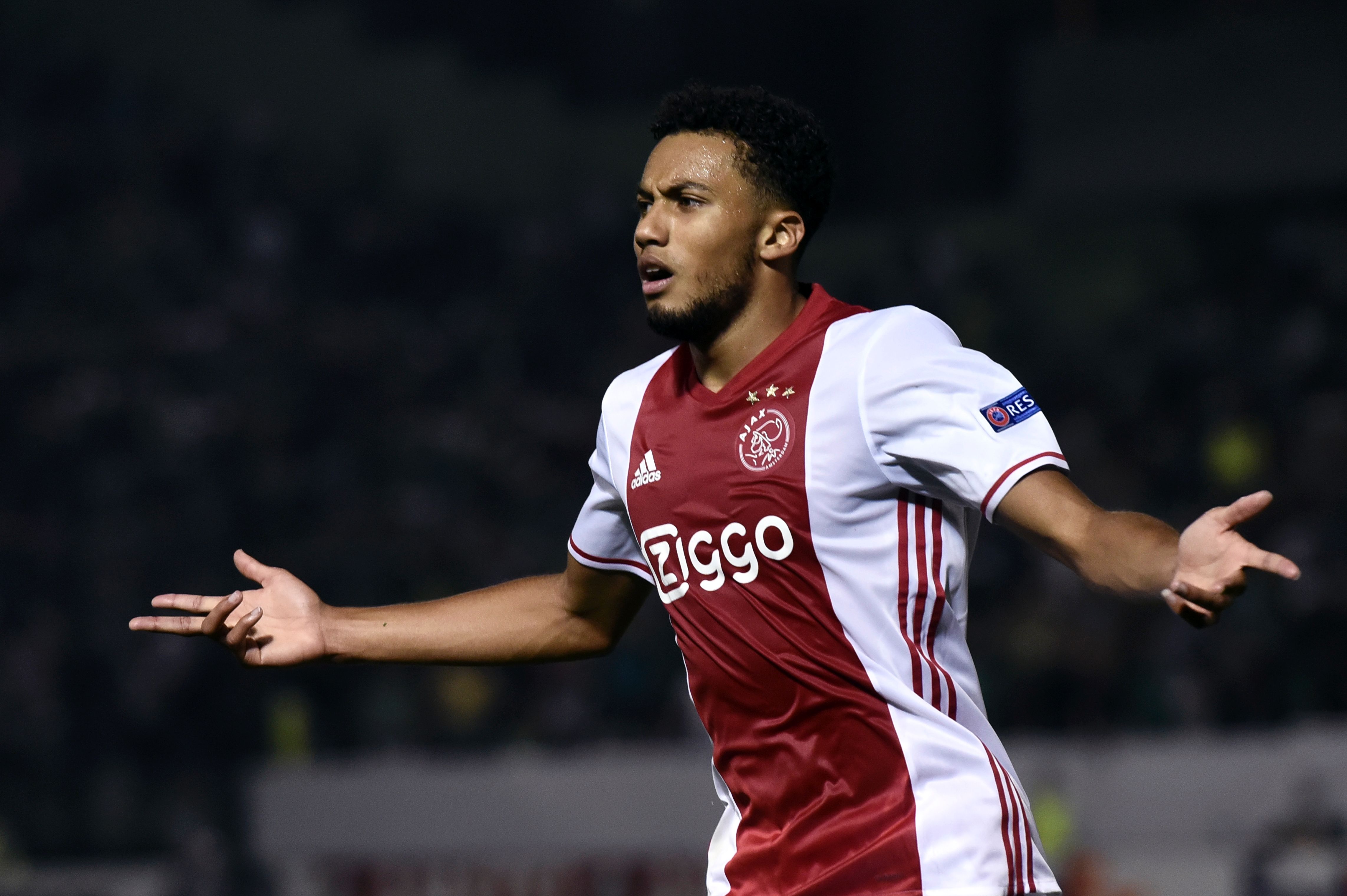 Ajax's Dutch defender Jairo Riedewald celebrates after scoring during the group G Europa League football match between Panathinaikos and Ajax Amsterdam on September 15, 2016 at Apostolos Nikolaidis stadium in Athens. / AFP / ARIS MESSINIS        (Photo credit should read ARIS MESSINIS/AFP/Getty Images)