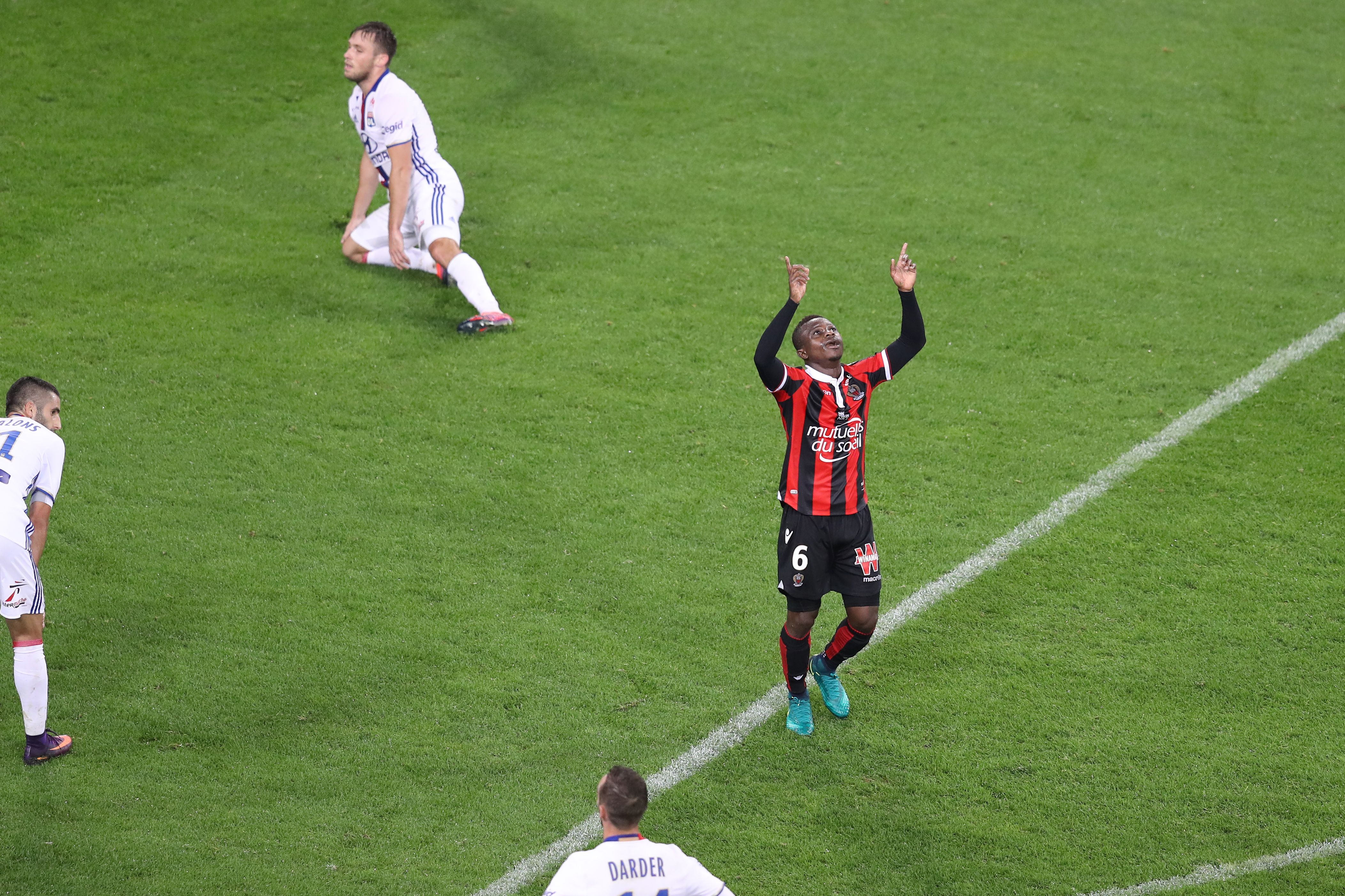 Nice's Ivorian midfielder Jean Michael Seri celebrates after scoring a goal during the French L1 football match Nice (OGCN) vs Lyon (OL) on October 14, 2016 at the "Allianz Riviera" stadium in Nice, southeastern France.   / AFP / VALERY HACHE        (Photo credit should read VALERY HACHE/AFP/Getty Images)