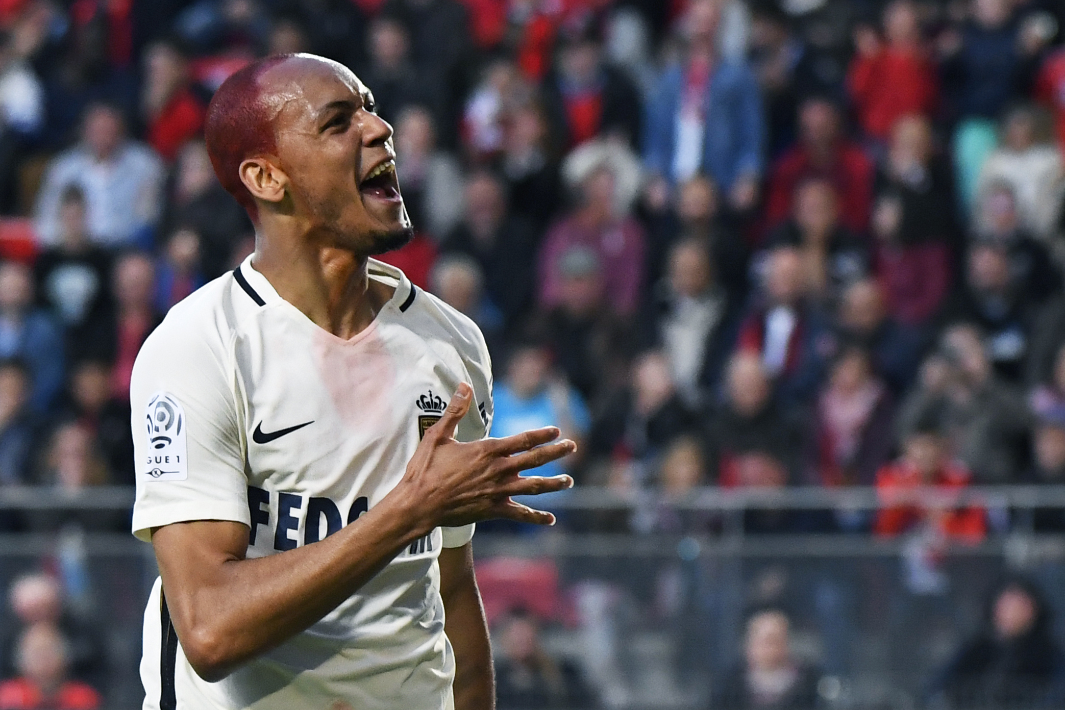 Monaco's Brazilian defender Fabinho celebrates after scoring a goal during the French L1 football match between Rennes (SRFC) and Monaco (ASM) on May, 20 2017, at the Roazhon Park stadium in Rennes, western France. / AFP PHOTO / DAMIEN MEYER        (Photo credit should read DAMIEN MEYER/AFP/Getty Images)