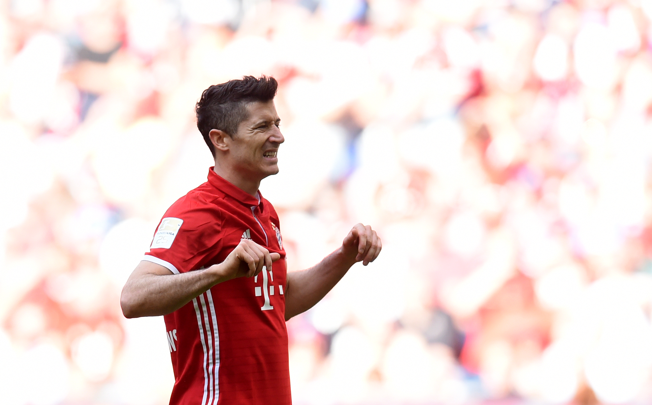 Bayern Munich's Polish striker Robert Lewandowski reacts during the German First division Bundesliga football match between FC Bayern Munich and SV Darmstadt 98 in Munich on May 6, 2017. / AFP PHOTO / Christof STACHE / RESTRICTIONS: DURING MATCH TIME: DFL RULES TO LIMIT THE ONLINE USAGE TO 15 PICTURES PER MATCH AND FORBID IMAGE SEQUENCES TO SIMULATE VIDEO. == RESTRICTED TO EDITORIAL USE == FOR FURTHER QUERIES PLEASE CONTACT DFL DIRECTLY AT + 49 69 650050
        (Photo credit should read CHRISTOF STACHE/AFP/Getty Images)