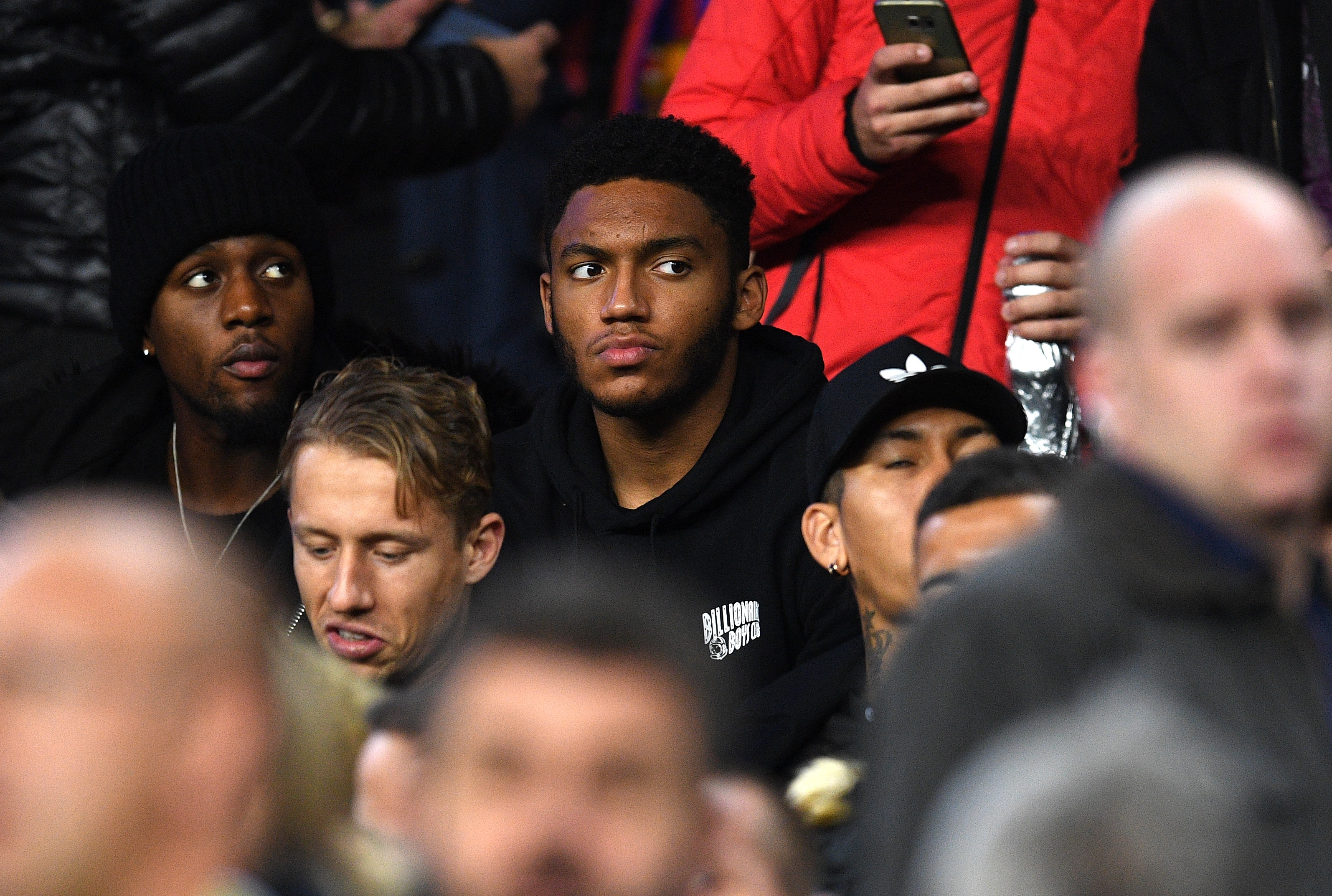 BARCELONA, SPAIN - DECEMBER 06: Joe Gomez of Liverpool (C) looks on from the stands during the UEFA Champions League Group C match between FC Barcelona and VfL Borussia Moenchengladbach at Camp Nou on December 6, 2016 in Barcelona, .  (Photo by David Ramos/Getty Images)