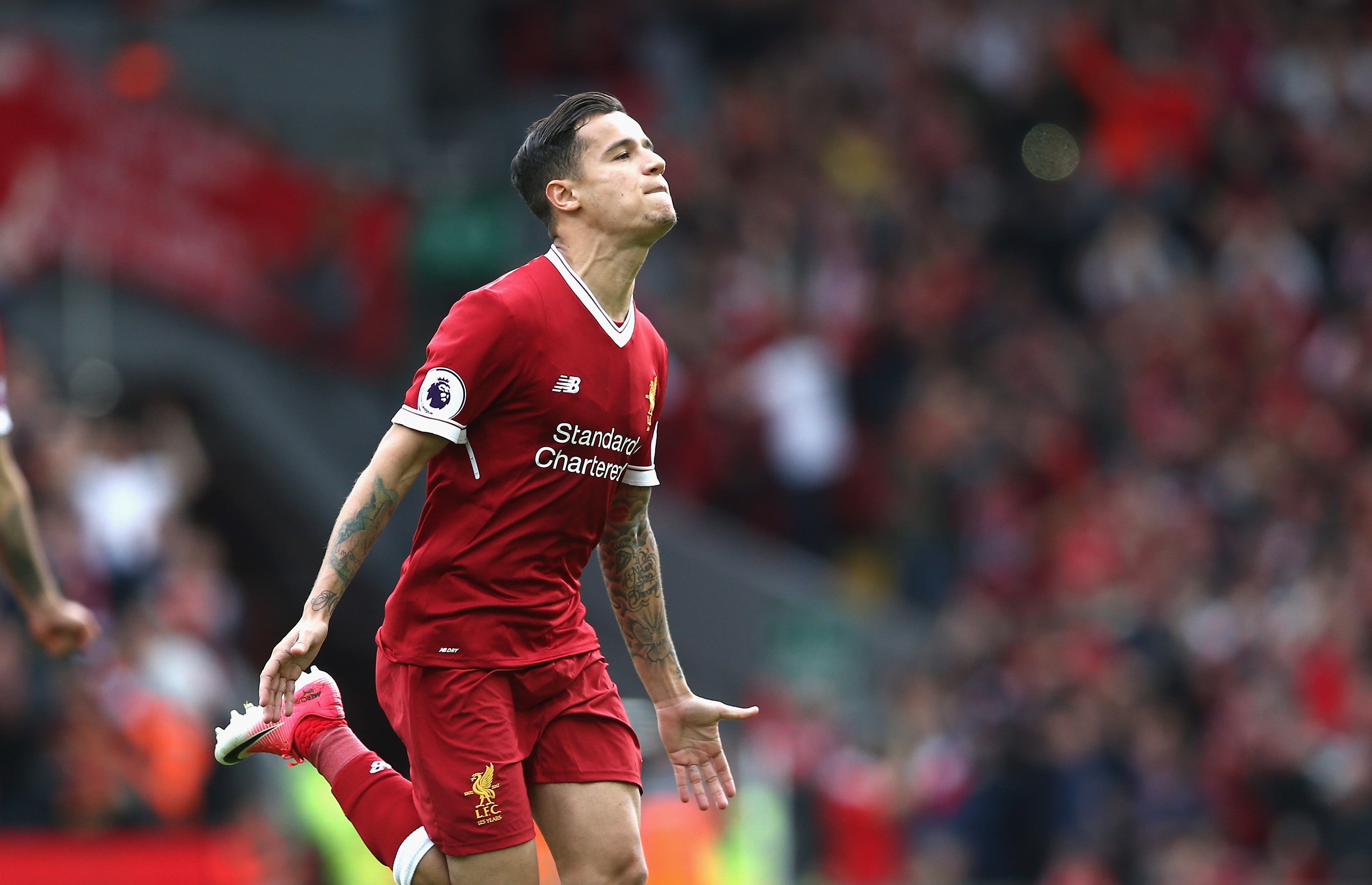 LIVERPOOL, ENGLAND - MAY 21:  Philippe Coutinho of Liverpool celebrates scoring his sides second goal during the Premier League match between Liverpool and Middlesbrough at Anfield on May 21, 2017 in Liverpool, England.  (Photo by Jan Kruger/Getty Images)