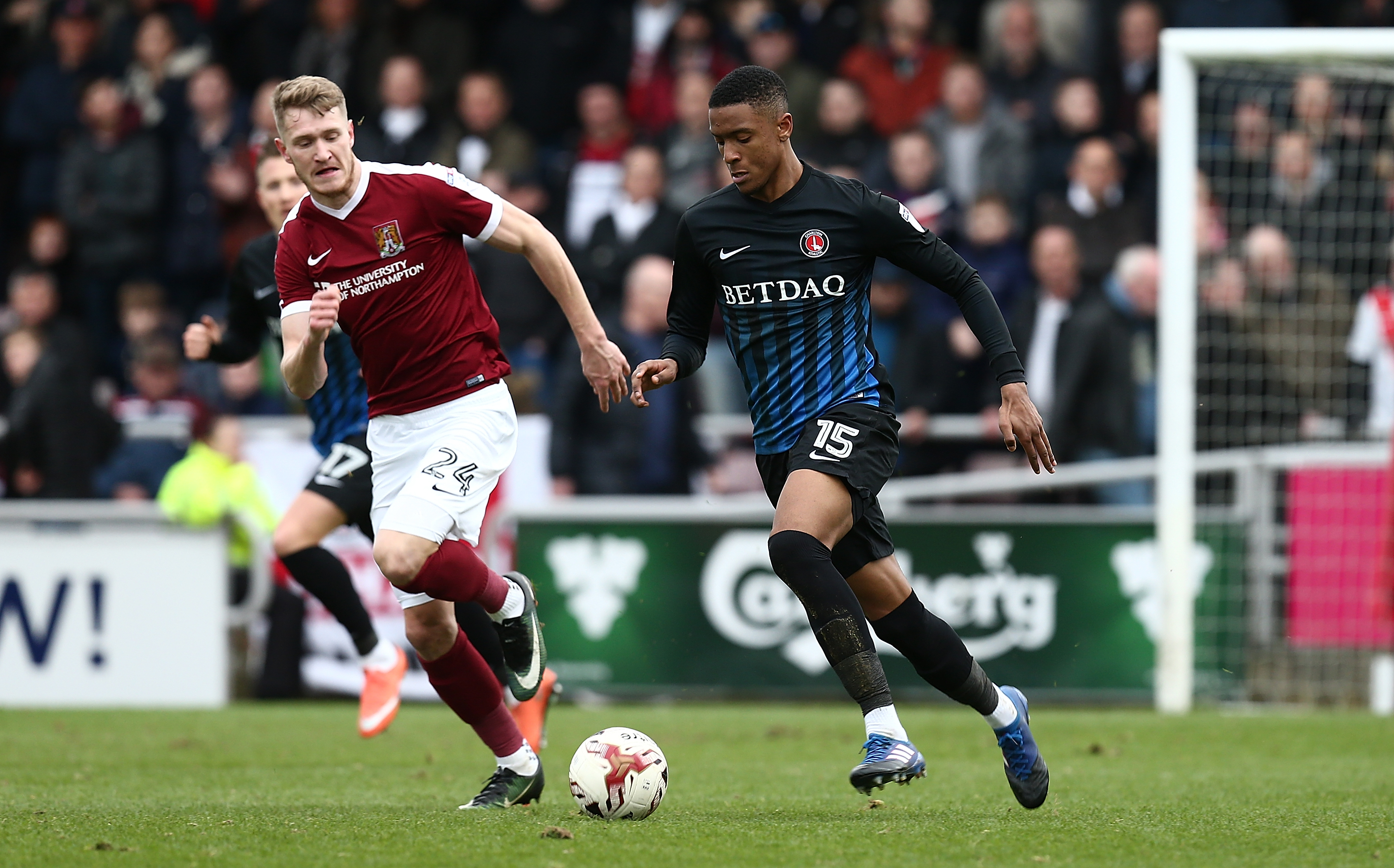 NORTHAMPTON, ENGLAND - MARCH 04:  Ezri Konsa Ngoyo of Charlton Athletic moves forward with the ball away from Michael Smith of Northampton Town during the Sky Bet League One match betweenNorthampton Town and Charlton Athletic at Sixfields on March 4, 2017 in Northampton, England.  (Photo by Pete Norton/Getty Images)