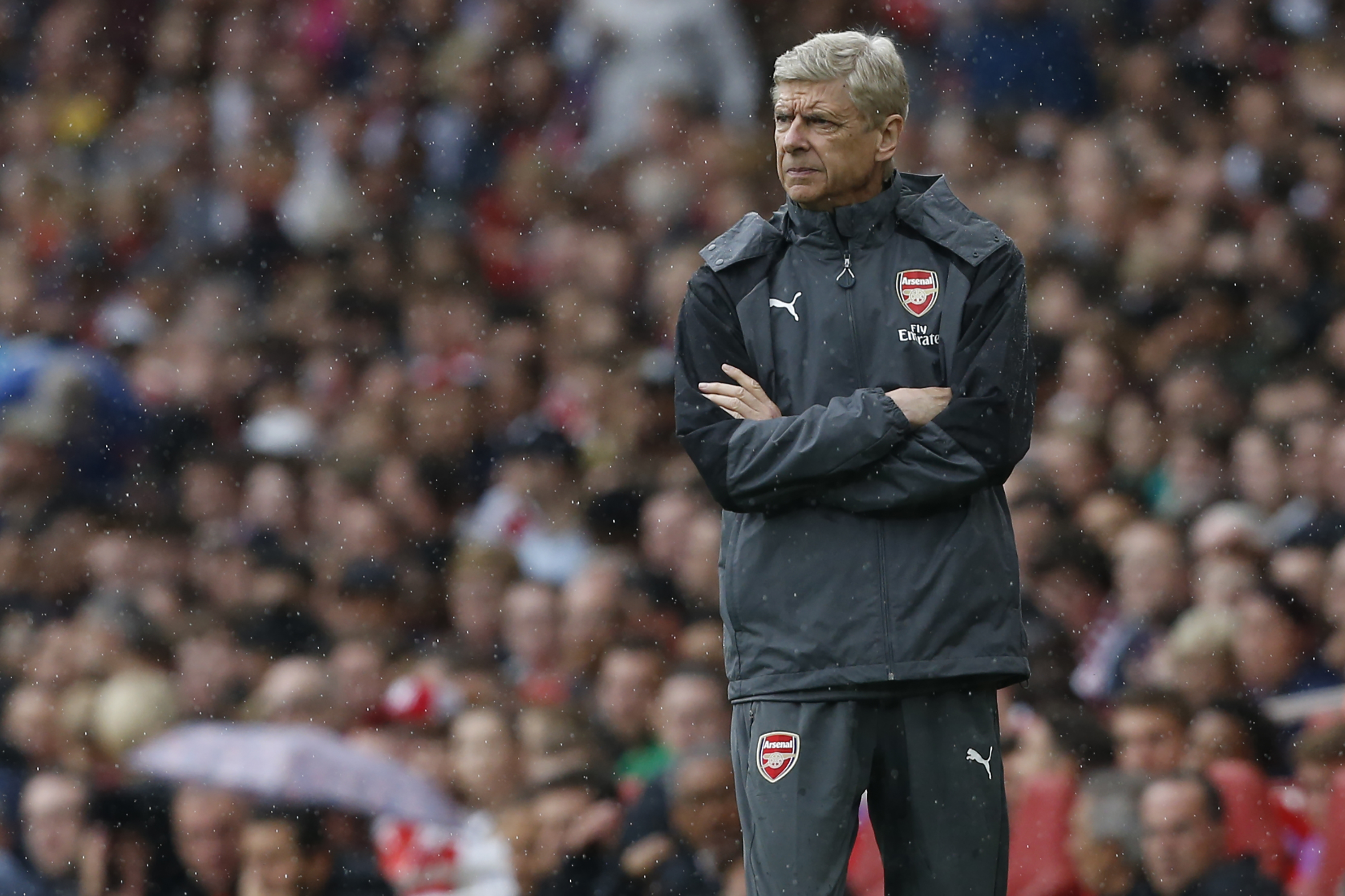 Arsenal's French manager Arsene Wenger watches from the touchline during the pre-season friendly football match between Arsenal and Benfica at The Emirates Stadium in north London on July 29, 2017, the game is one of four matches played over two days for the Emirates Cup. / AFP PHOTO / Ian KINGTON / RESTRICTED TO EDITORIAL USE. No use with unauthorized audio, video, data, fixture lists, club/league logos or 'live' services. Online in-match use limited to 75 images, no video emulation. No use in betting, games or single club/league/player publications.  /         (Photo credit should read IAN KINGTON/AFP/Getty Images)