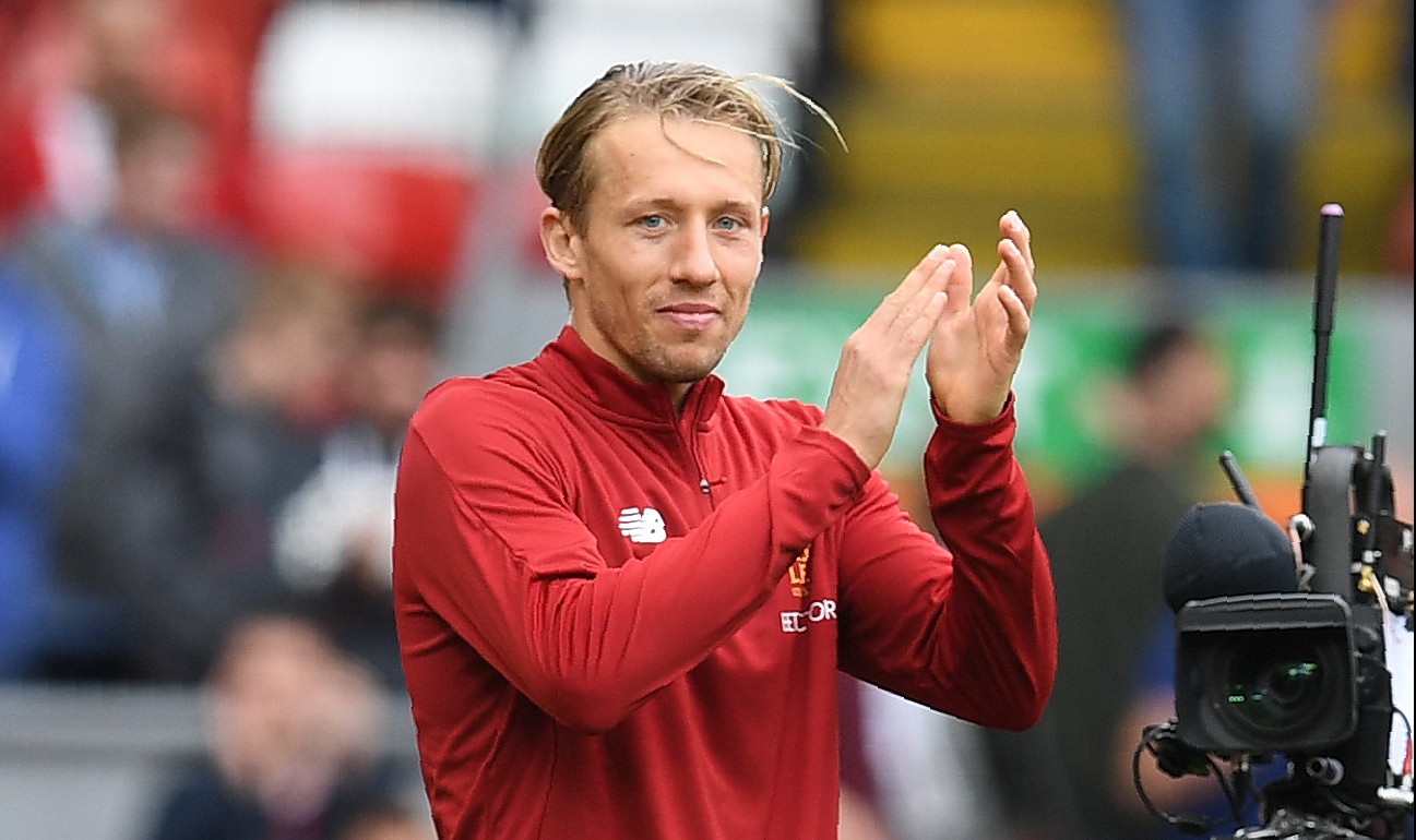 Liverpool's Brazilian midfielder Lucas Leiva applauds the fans following following the English Premier League football match between Liverpool and Middlesbrough at Anfield in Liverpool, north west England on May 21, 2017.
Liverpool won the match 3-0. / AFP PHOTO / Paul ELLIS / RESTRICTED TO EDITORIAL USE. No use with unauthorized audio, video, data, fixture lists, club/league logos or 'live' services. Online in-match use limited to 75 images, no video emulation. No use in betting, games or single club/league/player publications.  /         (Photo credit should read PAUL ELLIS/AFP/Getty Images)
