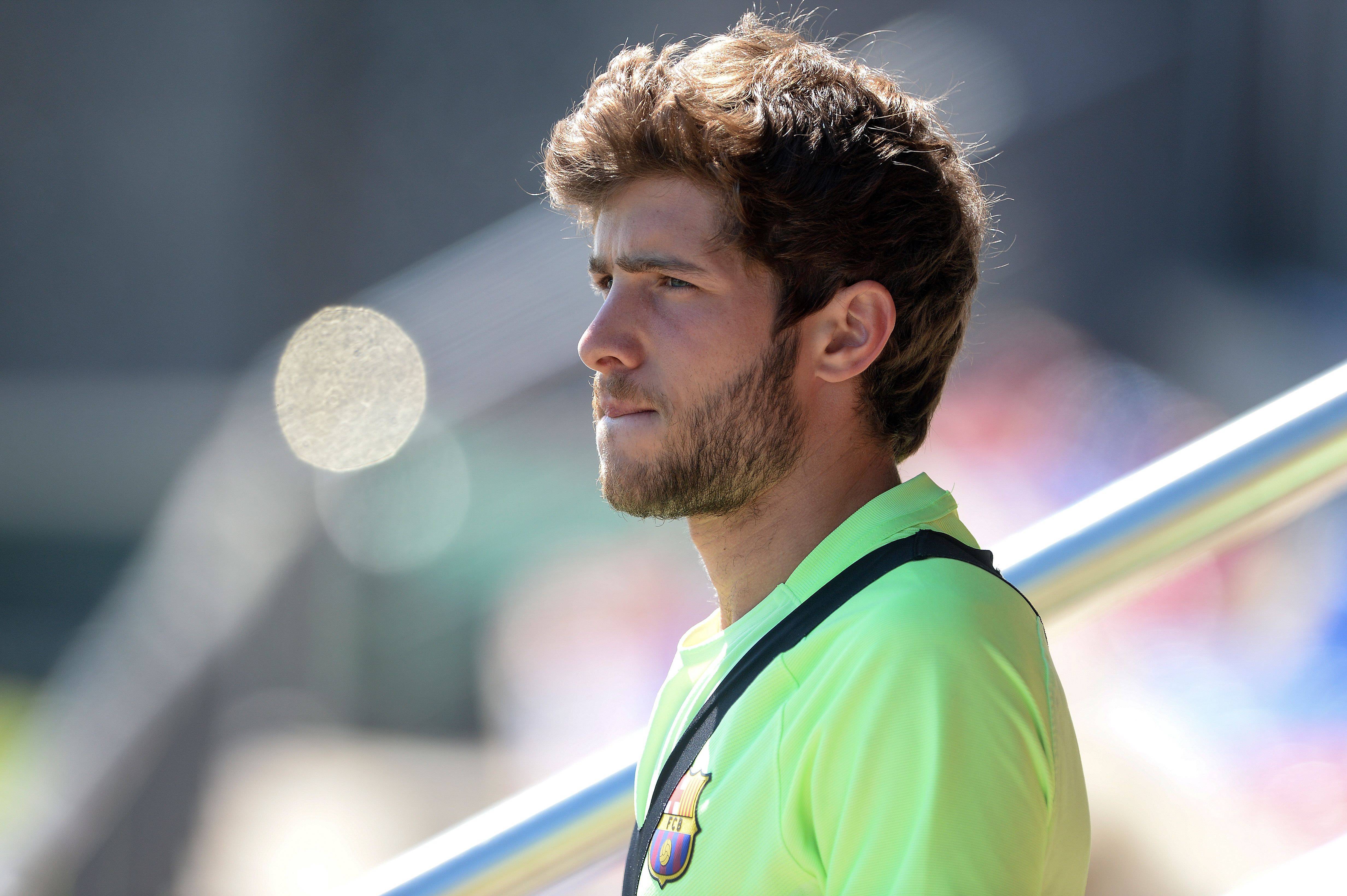 Barcelona's midfielder Sergi Roberto looks on as he arrives for a training session at the Sports Center FC Barcelona Joan Gamper in Sant Joan Despi, near Barcelona on May 20, 2017 on the eve of their last Spanish League football match FC Barcelona vs SD Eibar / AFP PHOTO / Josep LAGO        (Photo credit should read JOSEP LAGO/AFP/Getty Images)