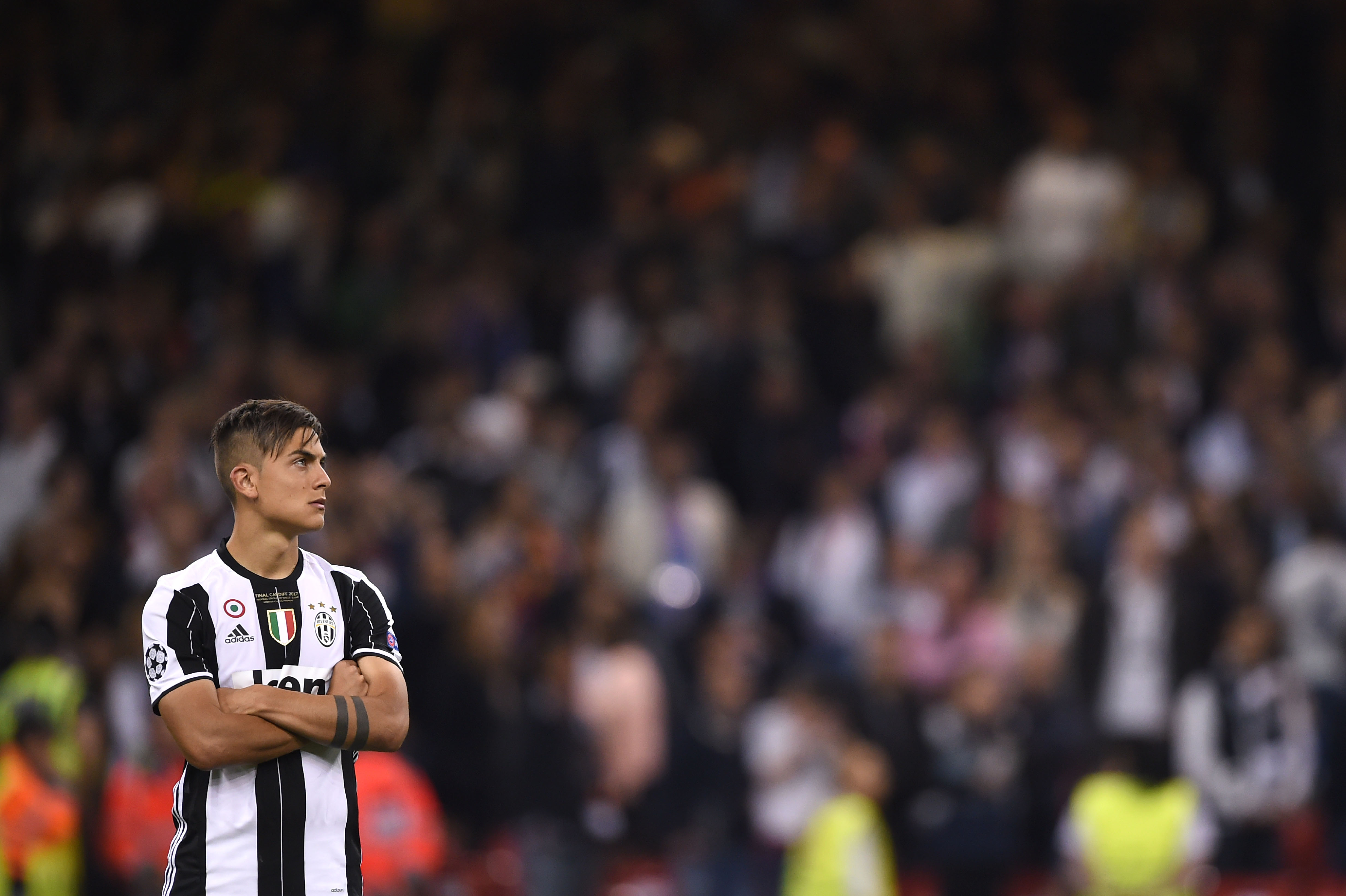 Juventus' Argentinian striker Paulo Dybala reacts after losing the UEFA Champions League final football match between Juventus and Real Madrid at The Principality Stadium in Cardiff, south Wales, on June 3, 2017. / AFP PHOTO / Filippo MONTEFORTE        (Photo credit should read FILIPPO MONTEFORTE/AFP/Getty Images)