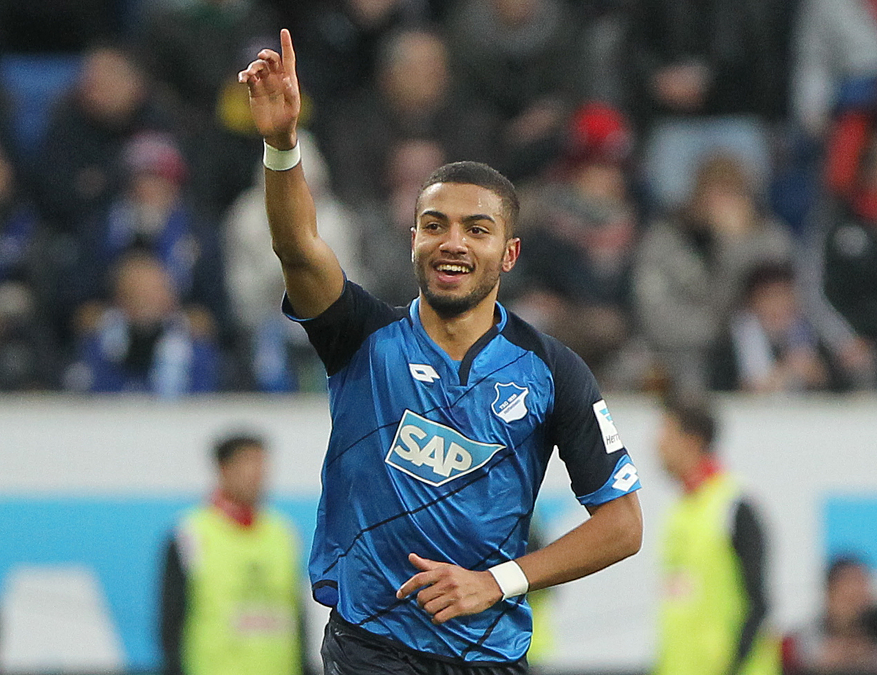 Hoffenheim's defender Jeremy Toljan celebrates scoring the 2-0 during the German first division Bundesliga football match between TSG Hoffenheim and 1 FC Cologne at the Wirsol Rhein-Neckar-Arena in Sinsheim, southern Germany, on December 03, 2016. / AFP / AMELIE QUERFURTH / RESTRICTIONS: DURING MATCH TIME: DFL RULES TO LIMIT THE ONLINE USAGE TO 15 PICTURES PER MATCH AND FORBID IMAGE SEQUENCES TO SIMULATE VIDEO. == RESTRICTED TO EDITORIAL USE == FOR FURTHER QUERIES PLEASE CONTACT DFL DIRECTLY AT + 49 69 650050
        (Photo credit should read AMELIE QUERFURTH/AFP/Getty Images)