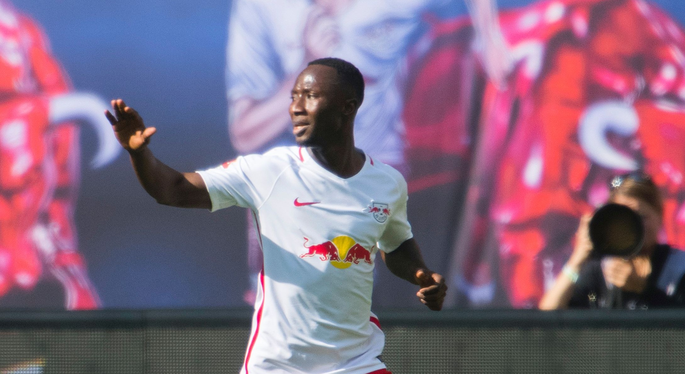 Leipzig's Guinean midfielder Naby Keita celebrates after scoring the 1-0 during the German First division Bundesliga football match between RB Leipzig and SV Darmstadt 98 in Leipzig, on April 1, 2017. / AFP PHOTO / ROBERT MICHAEL / RESTRICTIONS: DURING MATCH TIME: DFL RULES TO LIMIT THE ONLINE USAGE TO 15 PICTURES PER MATCH AND FORBID IMAGE SEQUENCES TO SIMULATE VIDEO. == RESTRICTED TO EDITORIAL USE == FOR FURTHER QUERIES PLEASE CONTACT DFL DIRECTLY AT + 49 69 650050
        (Photo credit should read ROBERT MICHAEL/AFP/Getty Images)