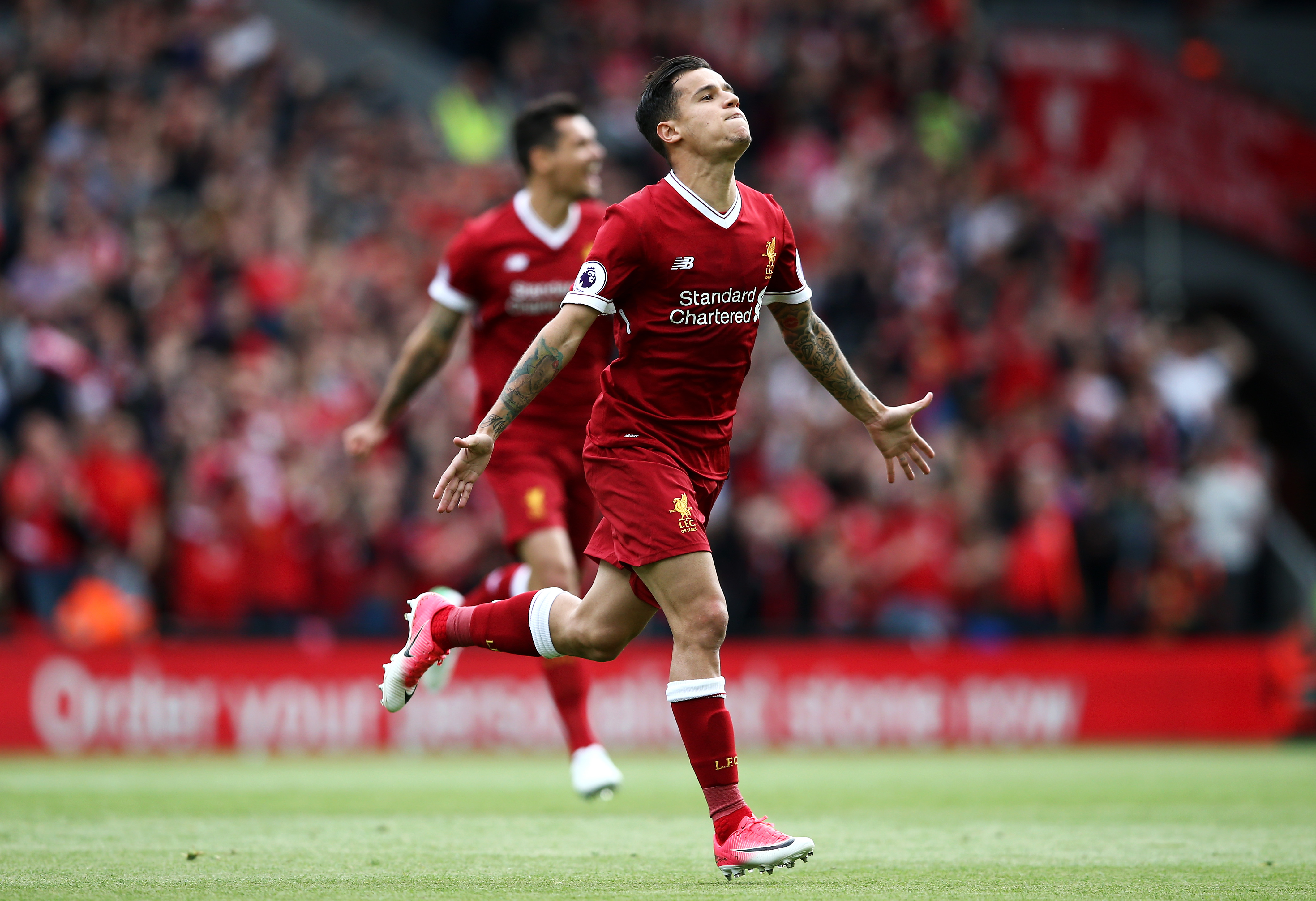 LIVERPOOL, ENGLAND - MAY 21:  Philippe Coutinho of Liverpool celebrates scoring his sides second goal during the Premier League match between Liverpool and Middlesbrough at Anfield on May 21, 2017 in Liverpool, England.  (Photo by Jan Kruger/Getty Images)