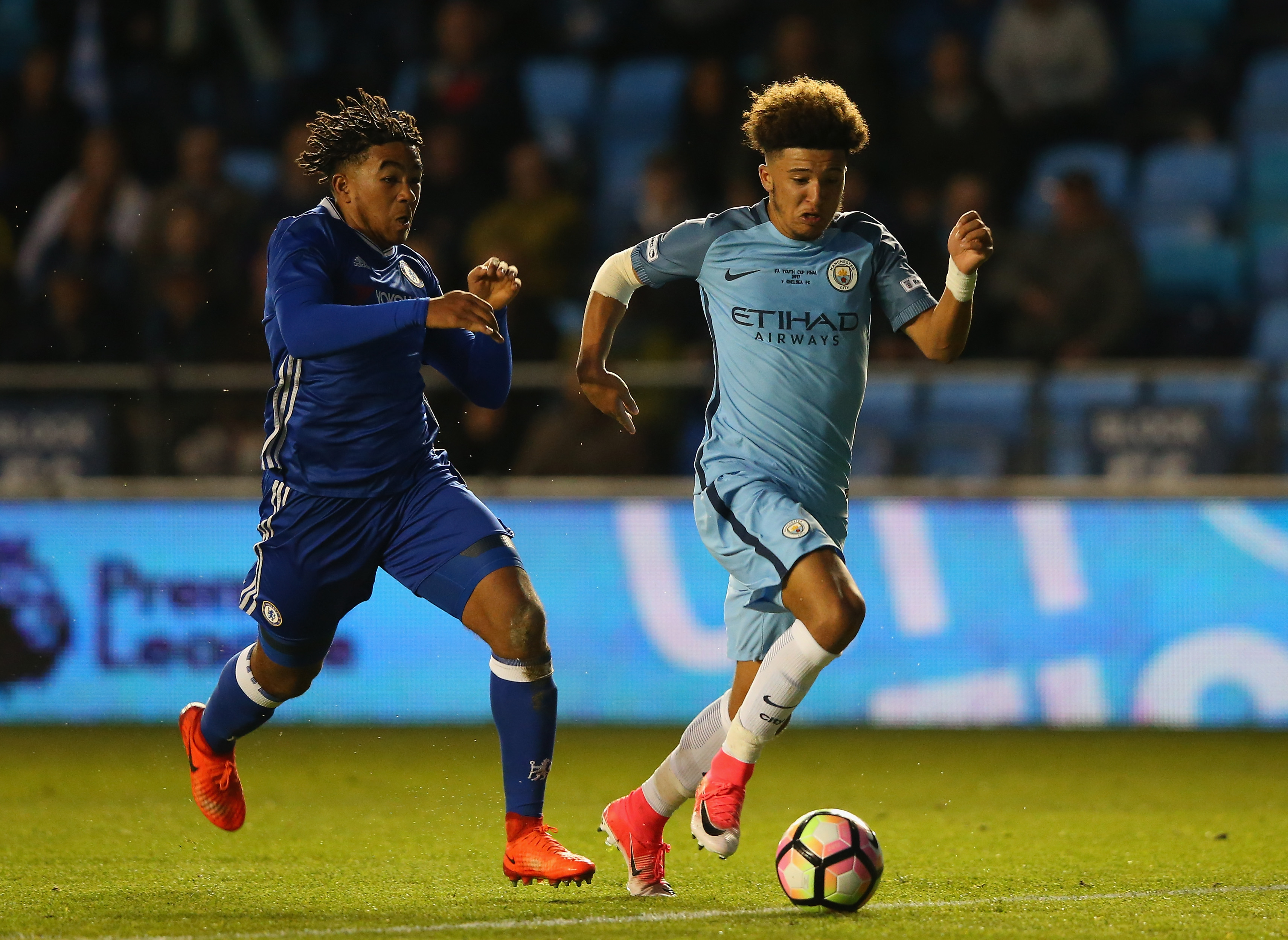 MANCHESTER, ENGLAND - APRIL 18: Jadon Sancho of Manchester City takes the ball past Reece James of Chelsea during the FA Youth Cup Final First Leg match between Manchester City and Chelsea at The Academy Stadium on April 18, 2017 in Manchester, England.  (Photo by Alex Livesey/Getty Images)