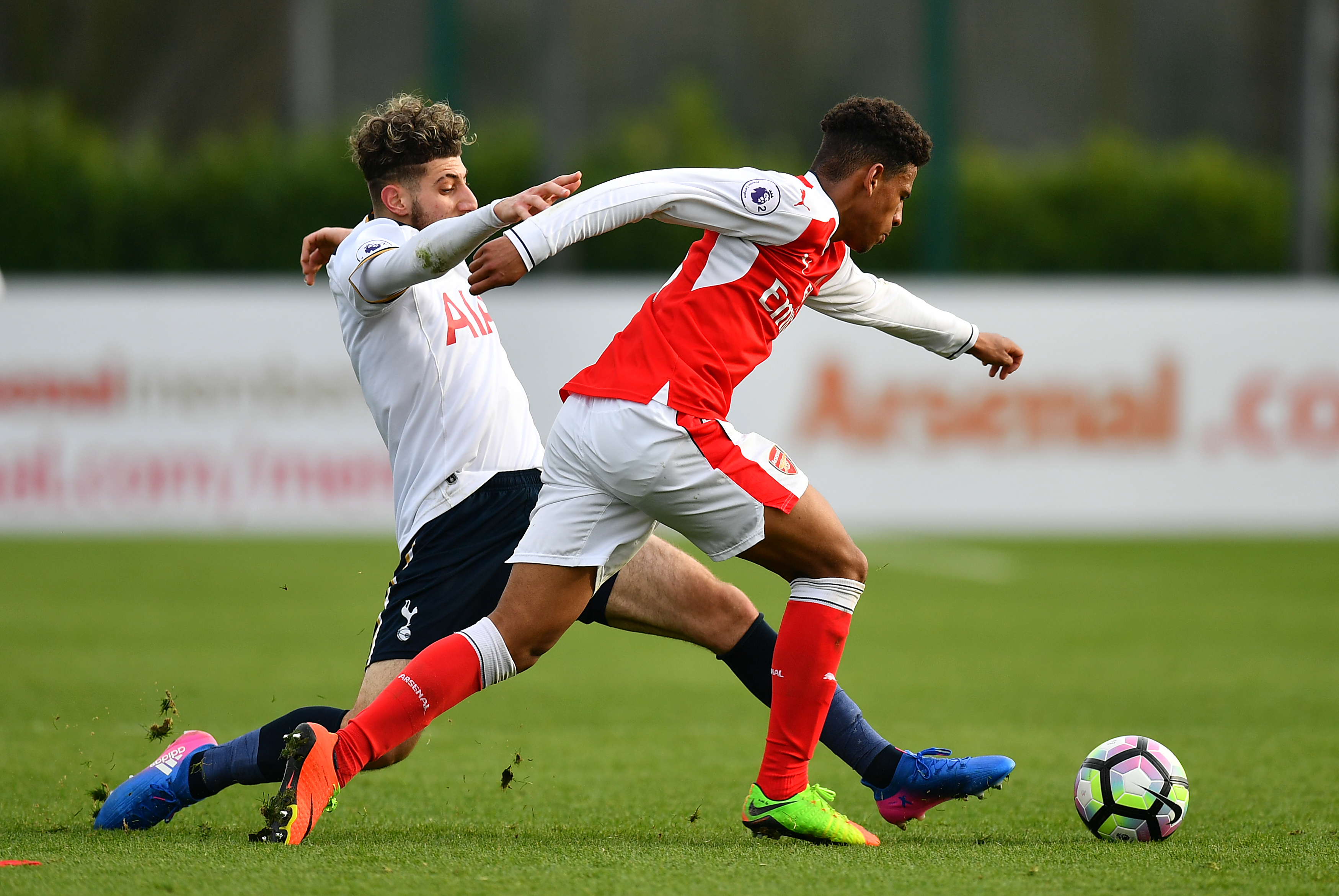 ST ALBANS, ENGLAND - MARCH 03:  Marcus McGuane of Arsenal is tackled by Zenon Stylianides of Tottenham Hotspur during the Premier League 2 match between Arsenal and Tottenham Hotspur at London Colney on March 3, 2017 in St Albans, England. (Photo by Dan Mullan/Getty Images)