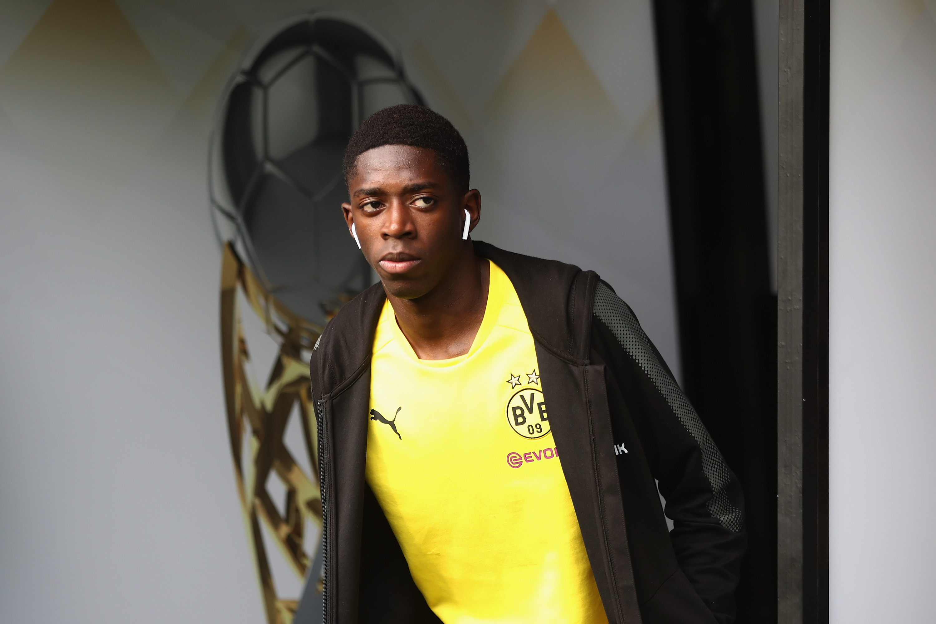 DORTMUND, GERMANY - AUGUST 05:  Ousmane Dembele of Dortmund walks out of the tunnel prior to the DFL Supercup 2017 match between Borussia Dortmund and Bayern Muenchen at Signal Iduna Park on August 5, 2017 in Dortmund, Germany.  (Photo by Alex Grimm/Bongarts/Getty Images )