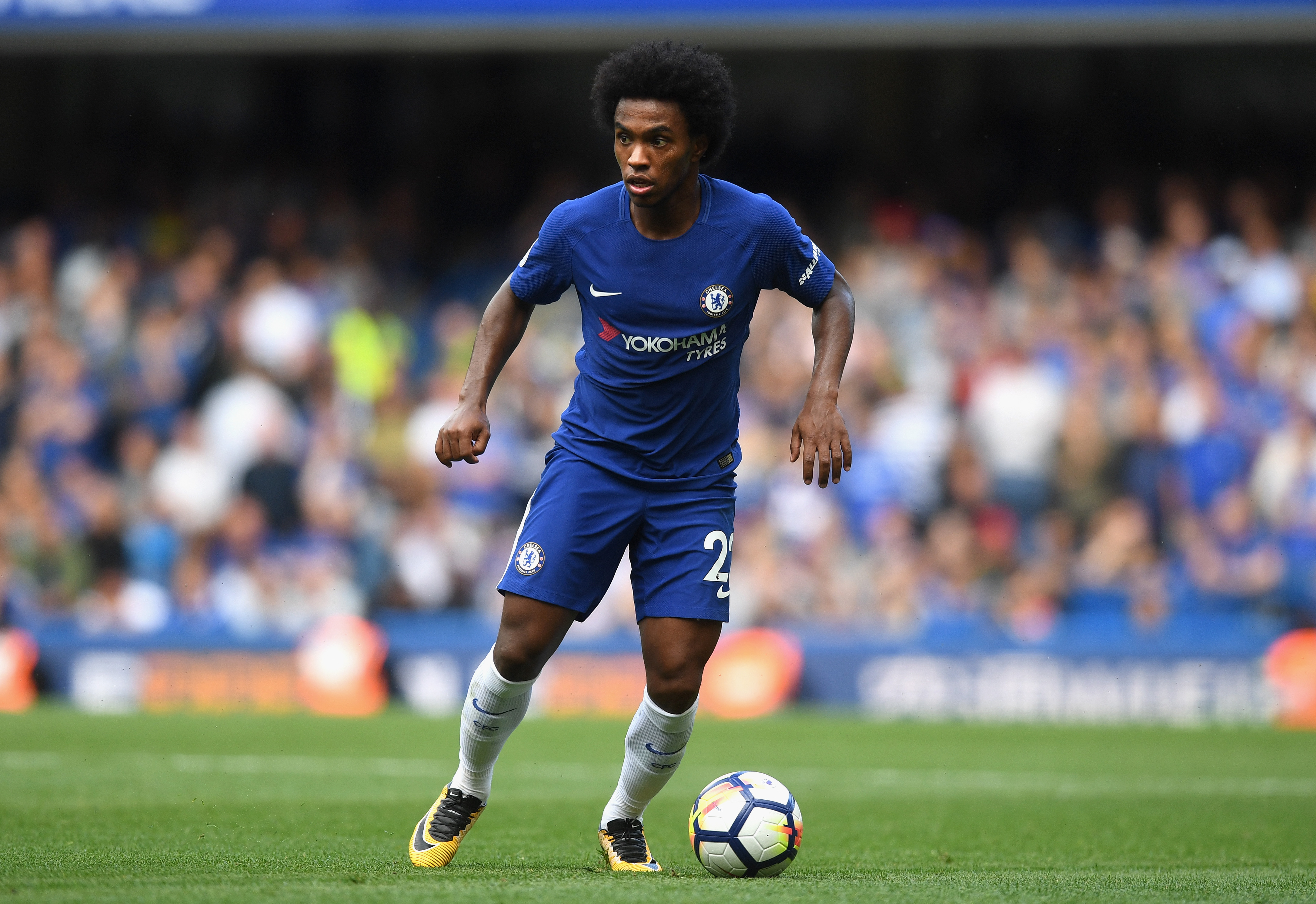 LONDON, ENGLAND - AUGUST 12:  Willian of Chelsea in action during the Premier League match between Chelsea and Burnley at Stamford Bridge on August 12, 2017 in London, England.  (Photo by Michael Regan/Getty Images)