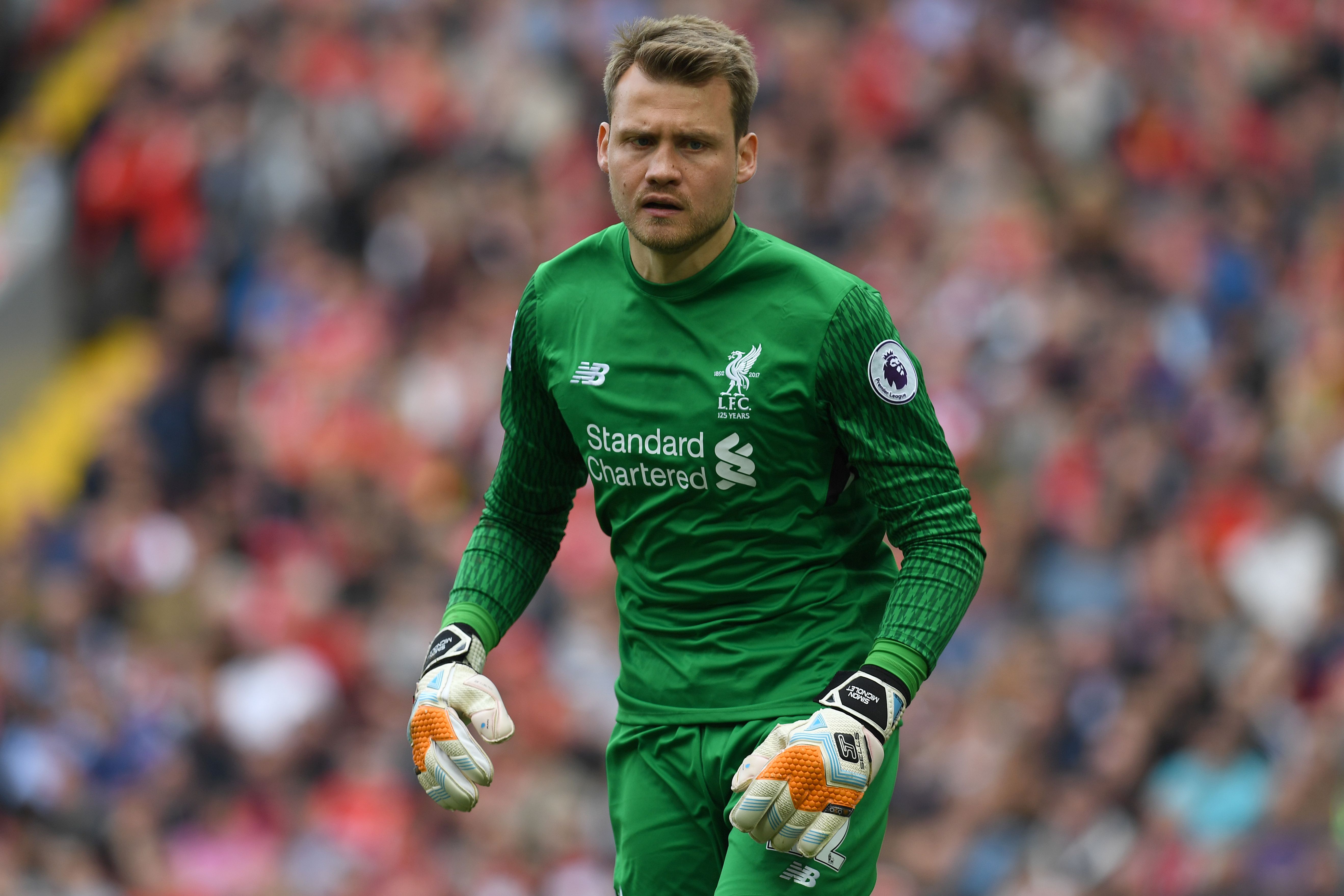 Liverpool's Belgian goalkeeper Simon Mignolet reacts during the English Premier League football match between Liverpool and Middlesbrough at Anfield in Liverpool, north west England on May 21, 2017. / AFP PHOTO / Paul ELLIS / RESTRICTED TO EDITORIAL USE. No use with unauthorized audio, video, data, fixture lists, club/league logos or 'live' services. Online in-match use limited to 75 images, no video emulation. No use in betting, games or single club/league/player publications.  /         (Photo credit should read PAUL ELLIS/AFP/Getty Images)