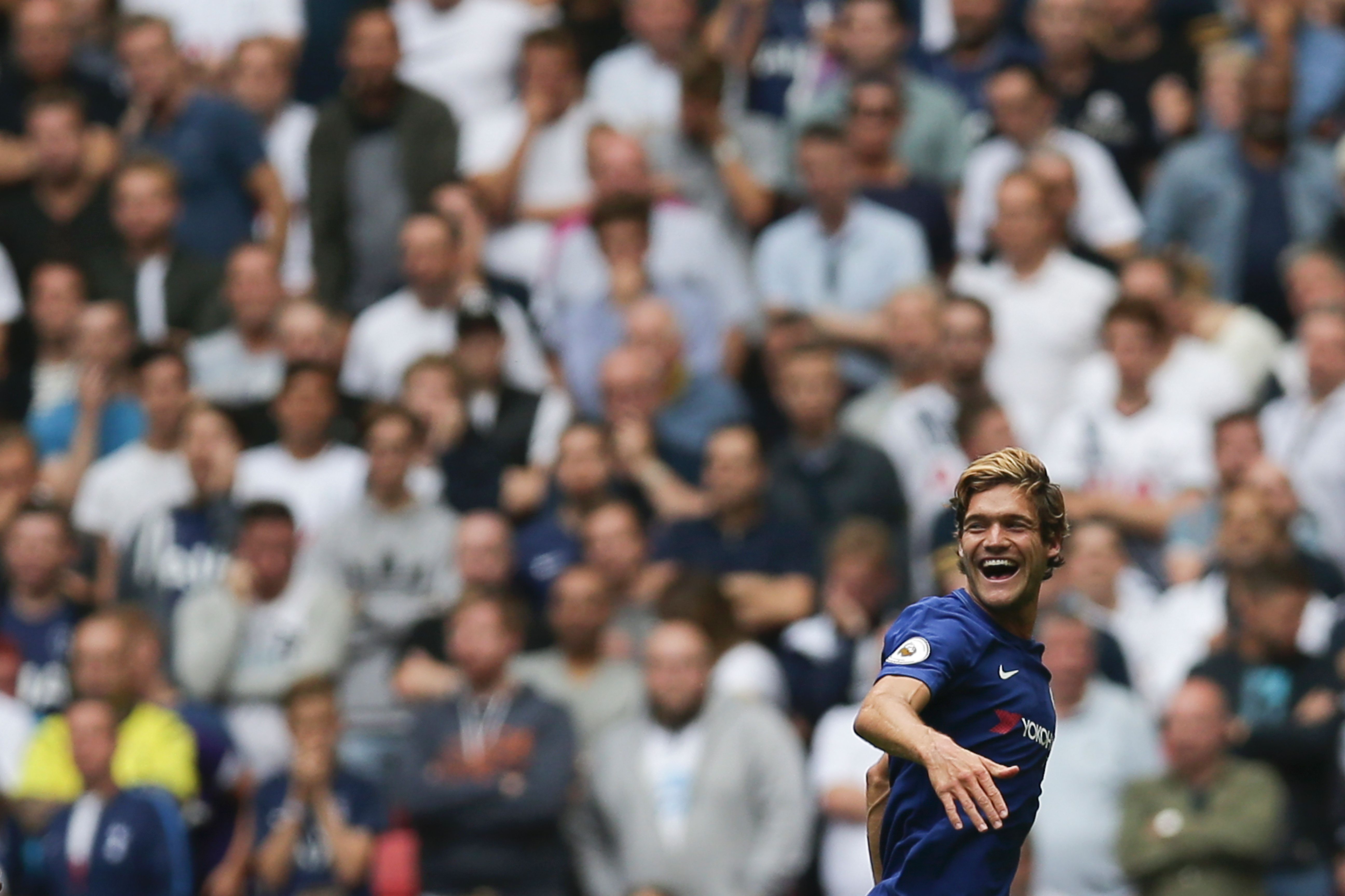 Chelsea's Spanish defender Marcos Alonso celebrates scoring the team's first goal during the English Premier League football match between Tottenham Hotspur and Chelsea at Wembley Stadium in London, on August 20, 2017. / AFP PHOTO / Daniel LEAL-OLIVAS / RESTRICTED TO EDITORIAL USE. No use with unauthorized audio, video, data, fixture lists, club/league logos or 'live' services. Online in-match use limited to 45 images, no video emulation. No use in betting, games or single club/league/player publications.        (Photo credit should read DANIEL LEAL-OLIVAS/AFP/Getty Images)