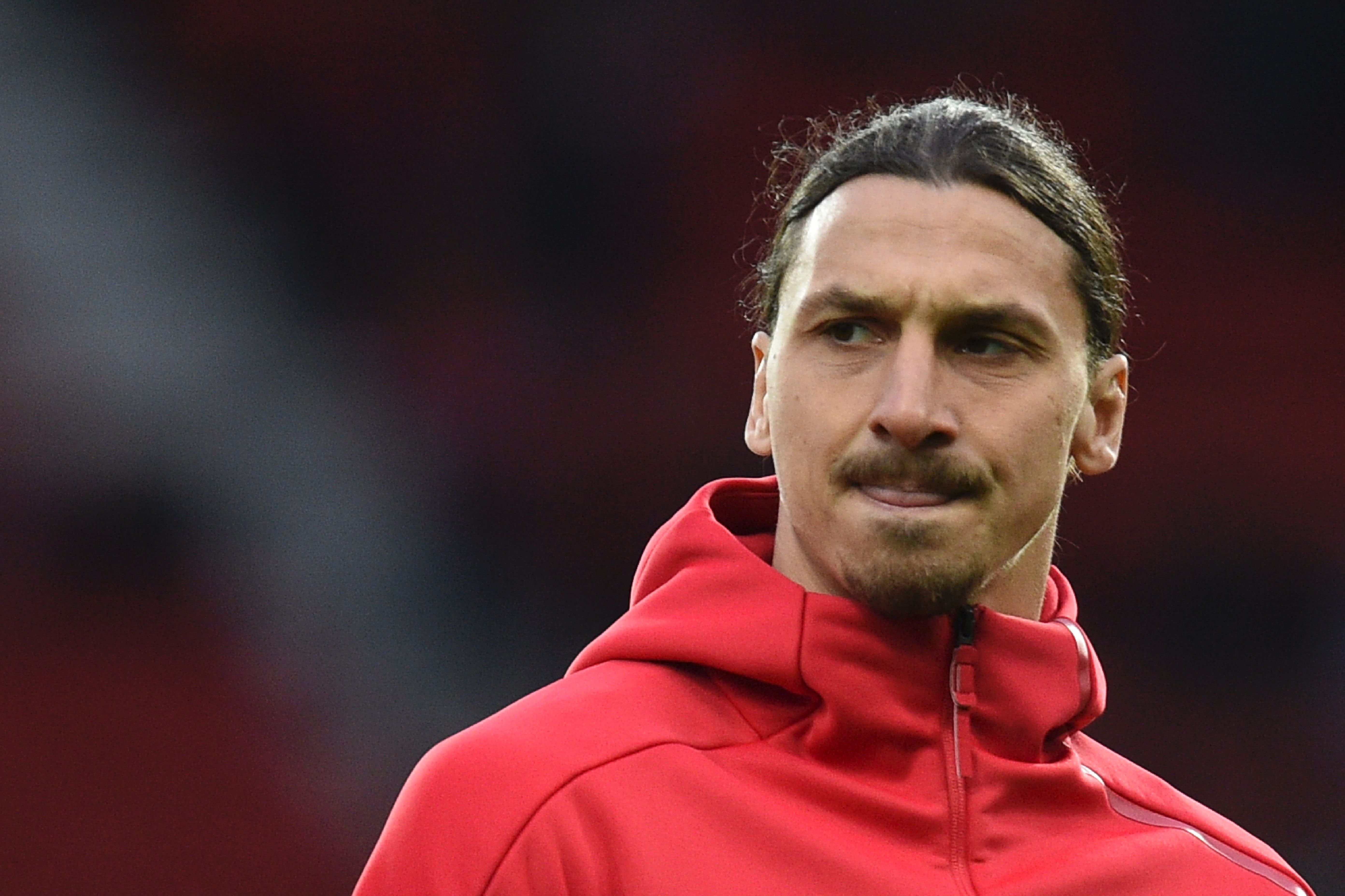 Manchester United's Swedish striker Zlatan Ibrahimovic warms up before the UEFA Europa League quarter-final second leg football match between Manchester United and Anderlecht at Old Trafford in Manchester, north west England, on April 20, 2017. / AFP PHOTO / Oli SCARFF        (Photo credit should read OLI SCARFF/AFP/Getty Images)