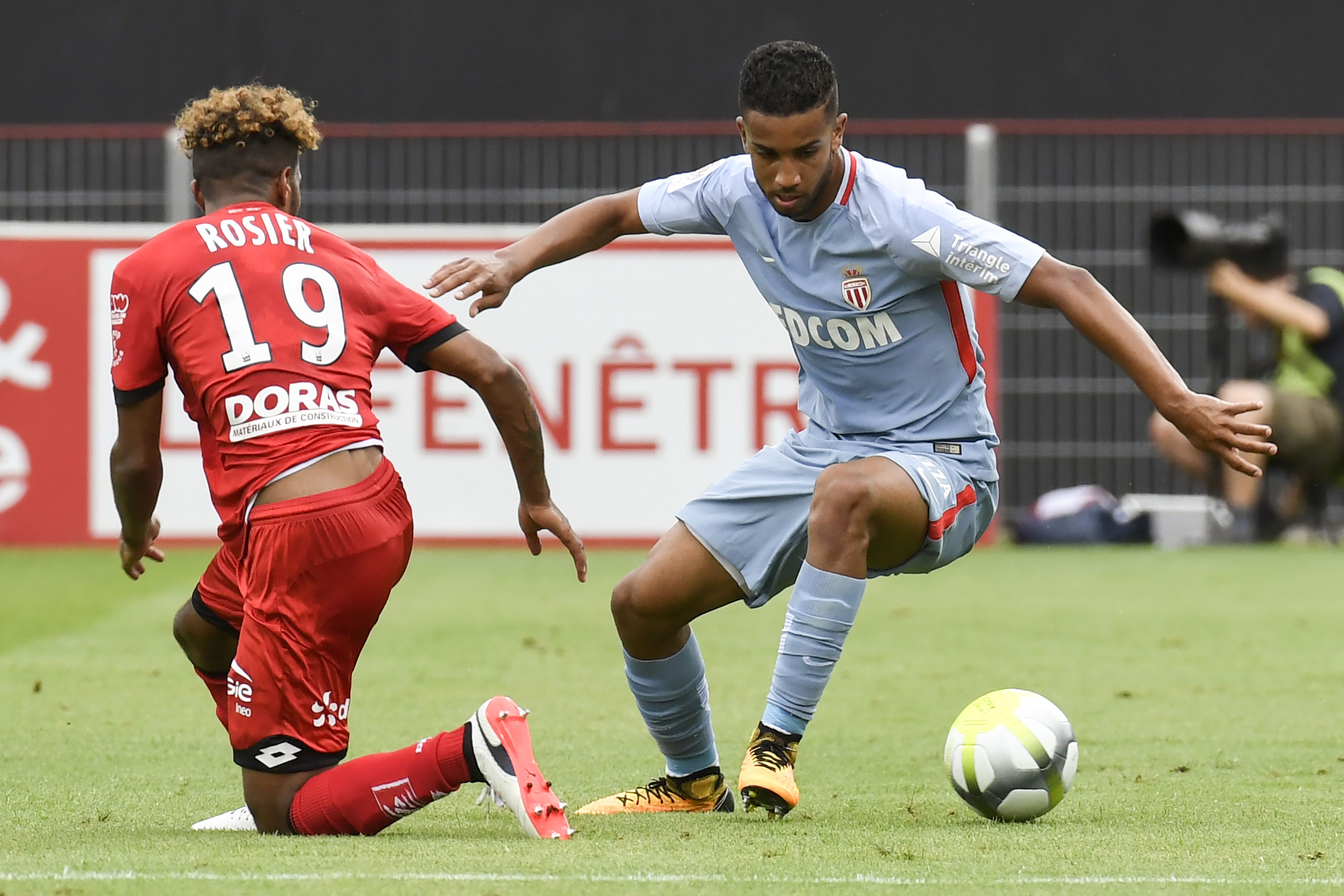 Monaco's French midfielder Thomas Lemar (R) vies with Dijon's French defender Valentin Rosier (L) during the French L1 football match between Dijon FCO and AS Monaco, on August 13, 2017 at Gaston Gerard stadium in Dijon, northern France. / AFP PHOTO / PHILIPPE DESMAZES        (Photo credit should read PHILIPPE DESMAZES/AFP/Getty Images)