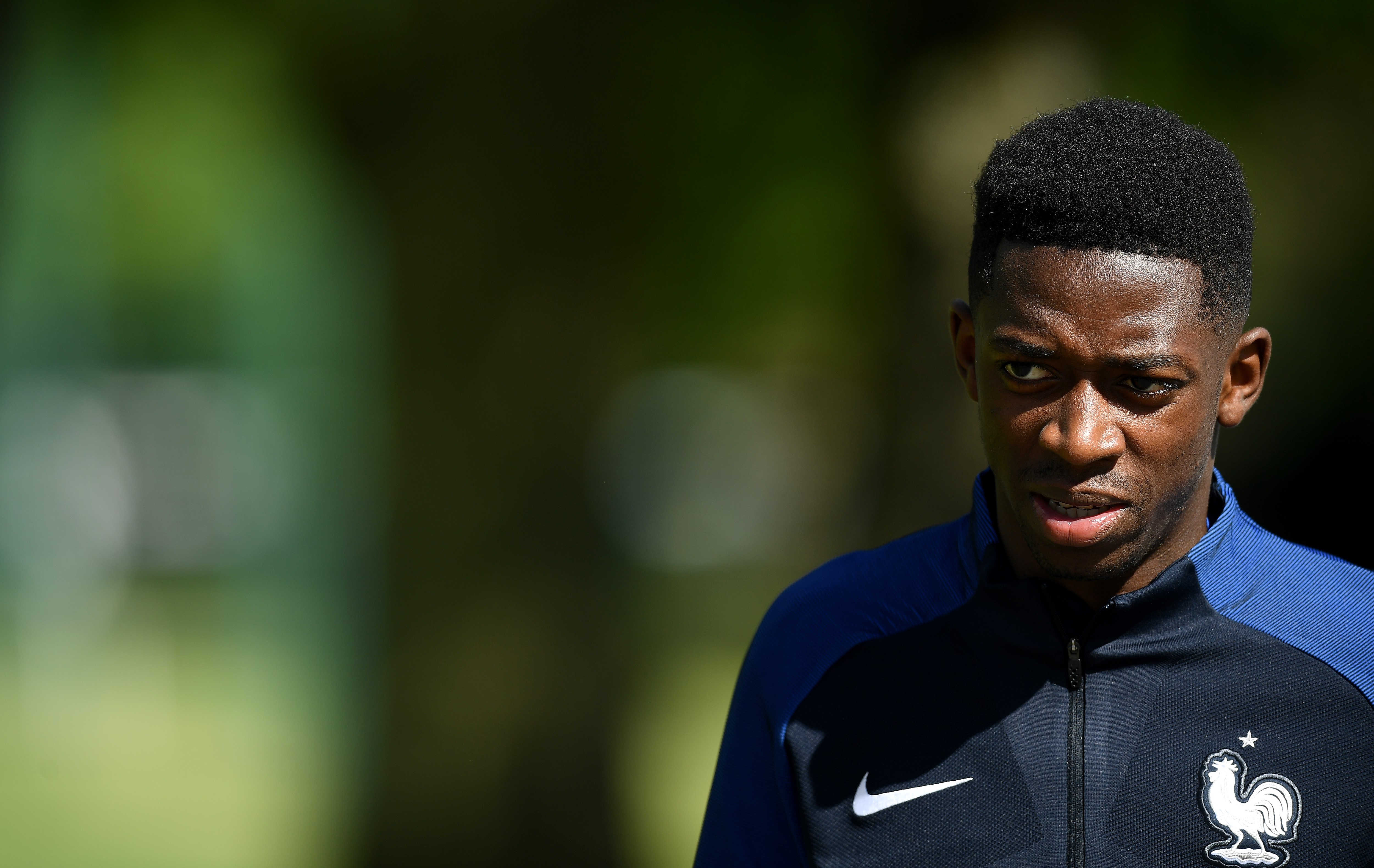 France's forward Ousmane Dembele arrives for a training session in Clairefontaine en Yvelines on June 6, 2017 as part of the team's preparation for the upcoming WC 2018 qualifiers against Sweden.  / AFP PHOTO / FRANCK FIFE        (Photo credit should read FRANCK FIFE/AFP/Getty Images)