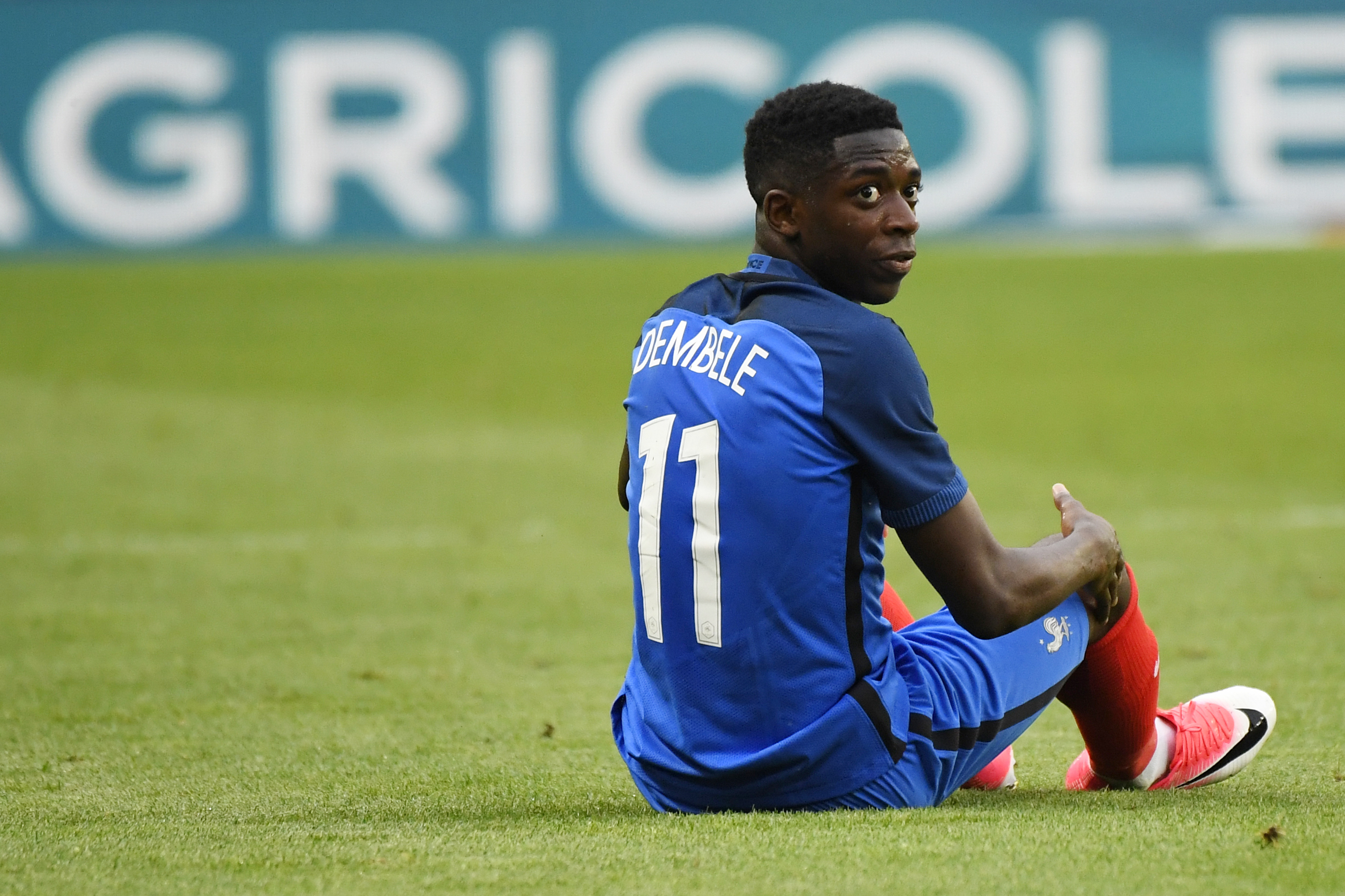 France's forward Ousmane Dembele looks on during the friendly football match between France and Paraguay on June 02, 2017 at the Roazhon park stadium in Rennes, western France. / AFP PHOTO / DAMIEN MEYER        (Photo credit should read DAMIEN MEYER/AFP/Getty Images)