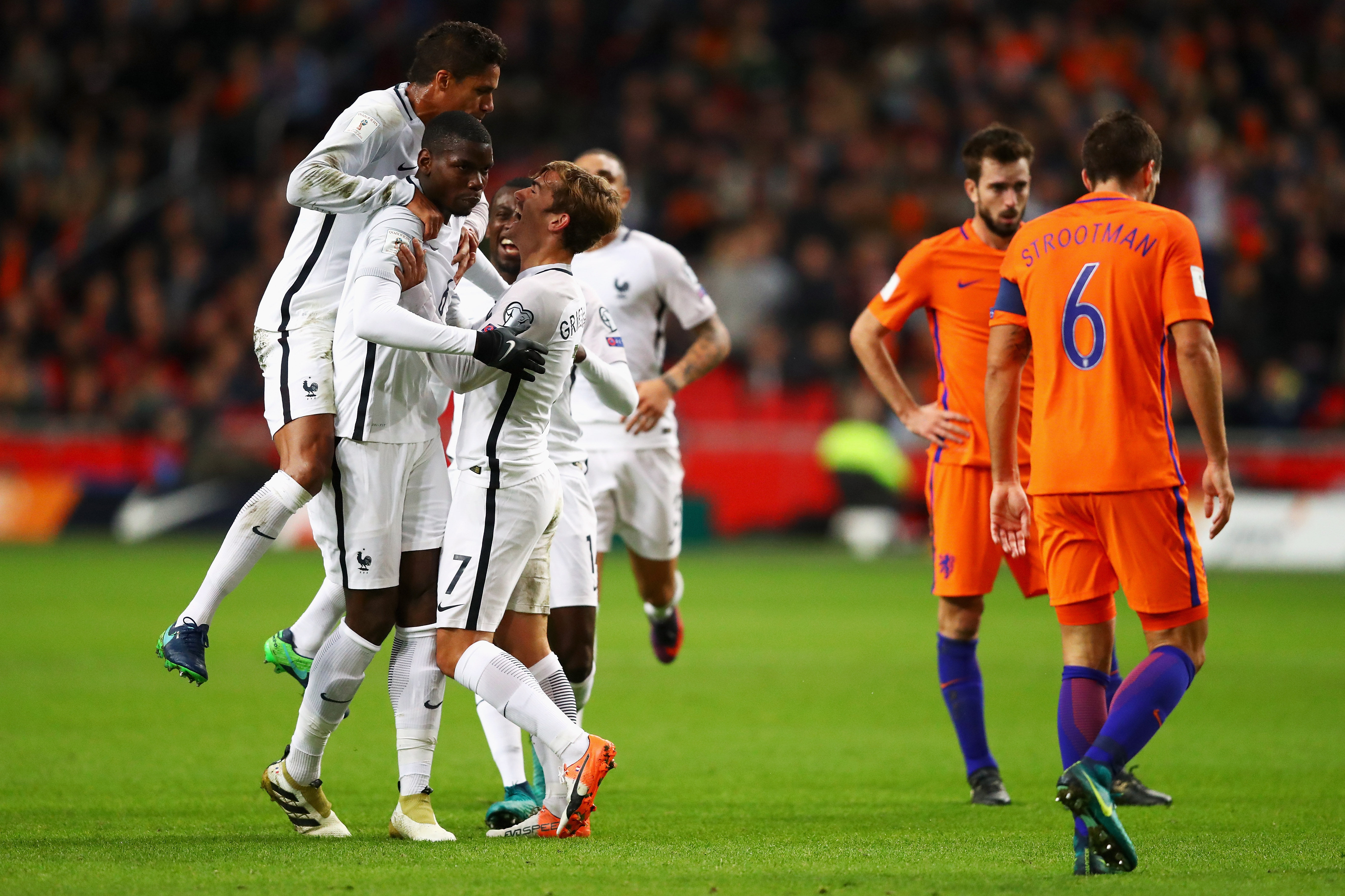 AMSTERDAM, NETHERLANDS - OCTOBER 10:  Paul Pogba of France celebrates scoring his teams first goal of the game with team mates during the FIFA 2018 World Cup Qualifier between Netherlands and France held at Amsterdam Arena on October 10, 2016 in Amsterdam, Netherlands.  (Photo by Dean Mouhtaropoulos/Getty Images)