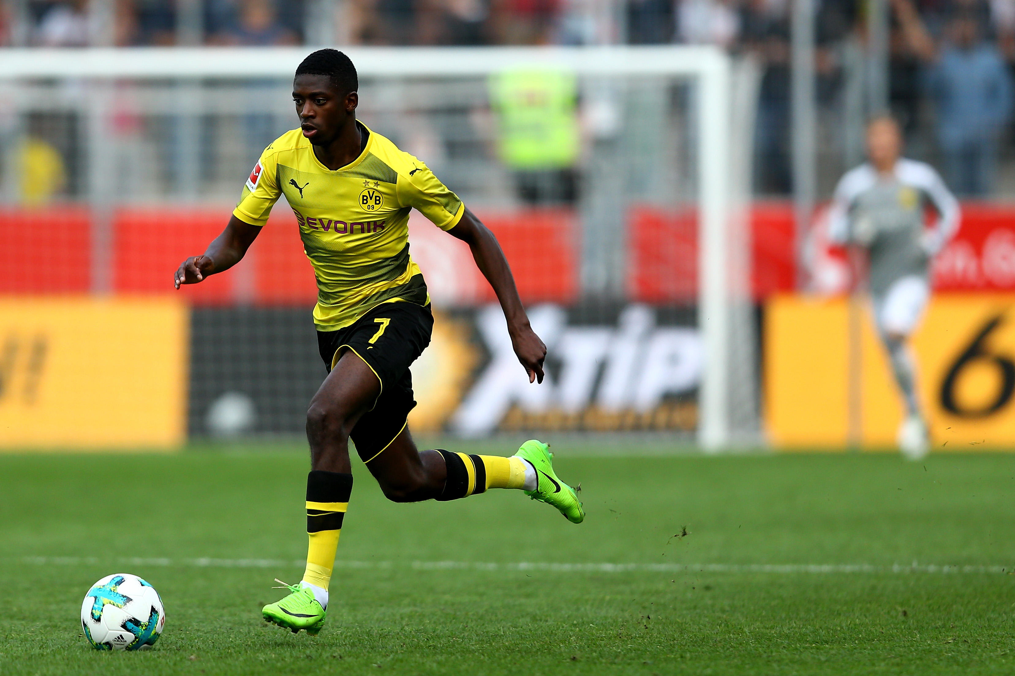 ESSEN, GERMANY - JULY 11:  Ousmane Dembele of Dortmund runs with the ball during the preseason friendly match between Rot-Weiss Essen and Borussia Dortmund at Stadion Essen on July 11, 2017 in Essen, Germany.  (Photo by Christof Koepsel/Bongarts/Getty Images)