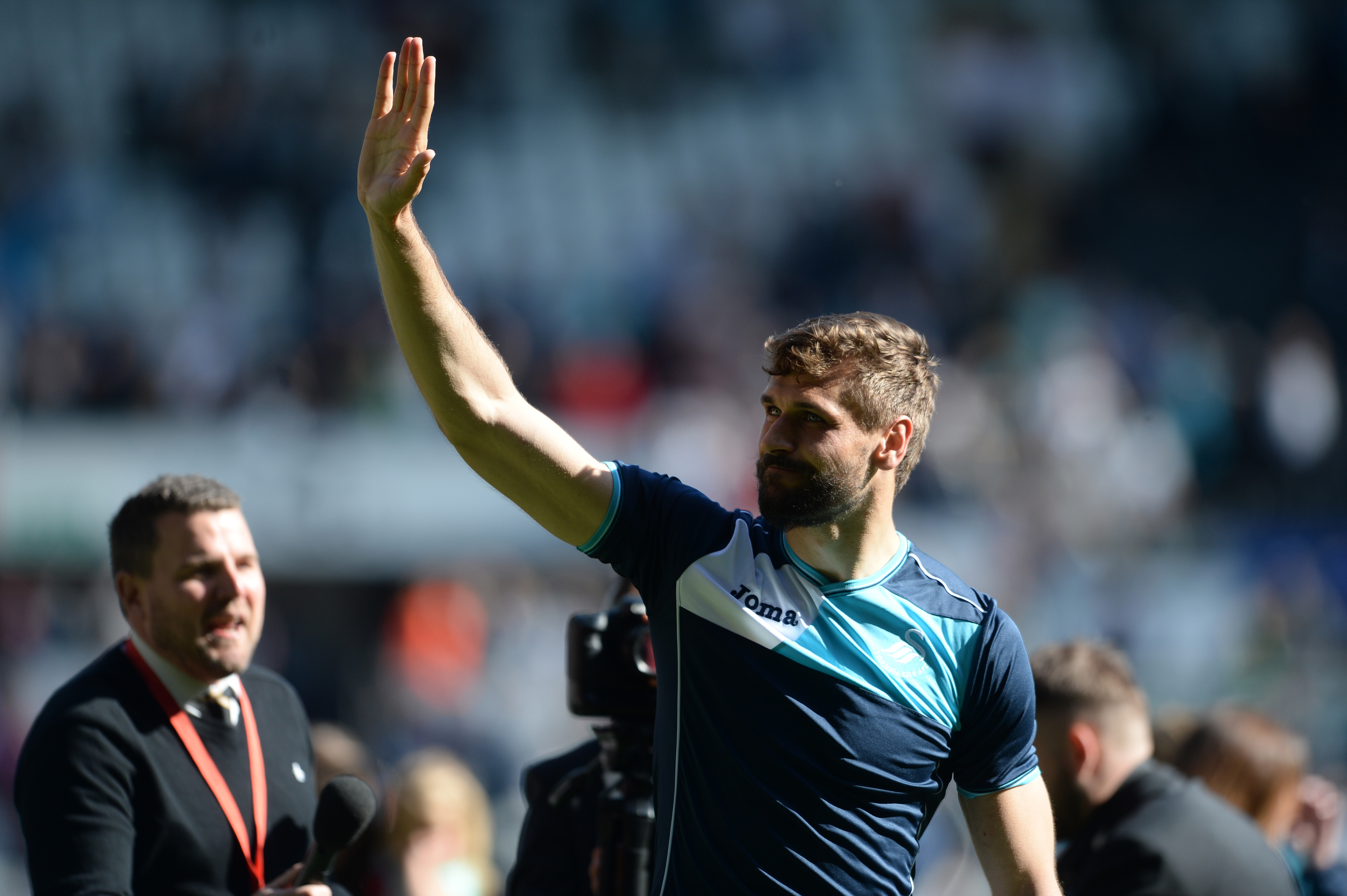 SWANSEA, UNITED KINGDOM - MAY 21: Fernando Llorente of Swansea celebrates at the final whistle during the Premier League match between Swansea City and West Bromwich Albion at the Liberty Stadium on May 21, 2017 in Swansea, Wales. (Photo by Harry Trump/Getty Images)