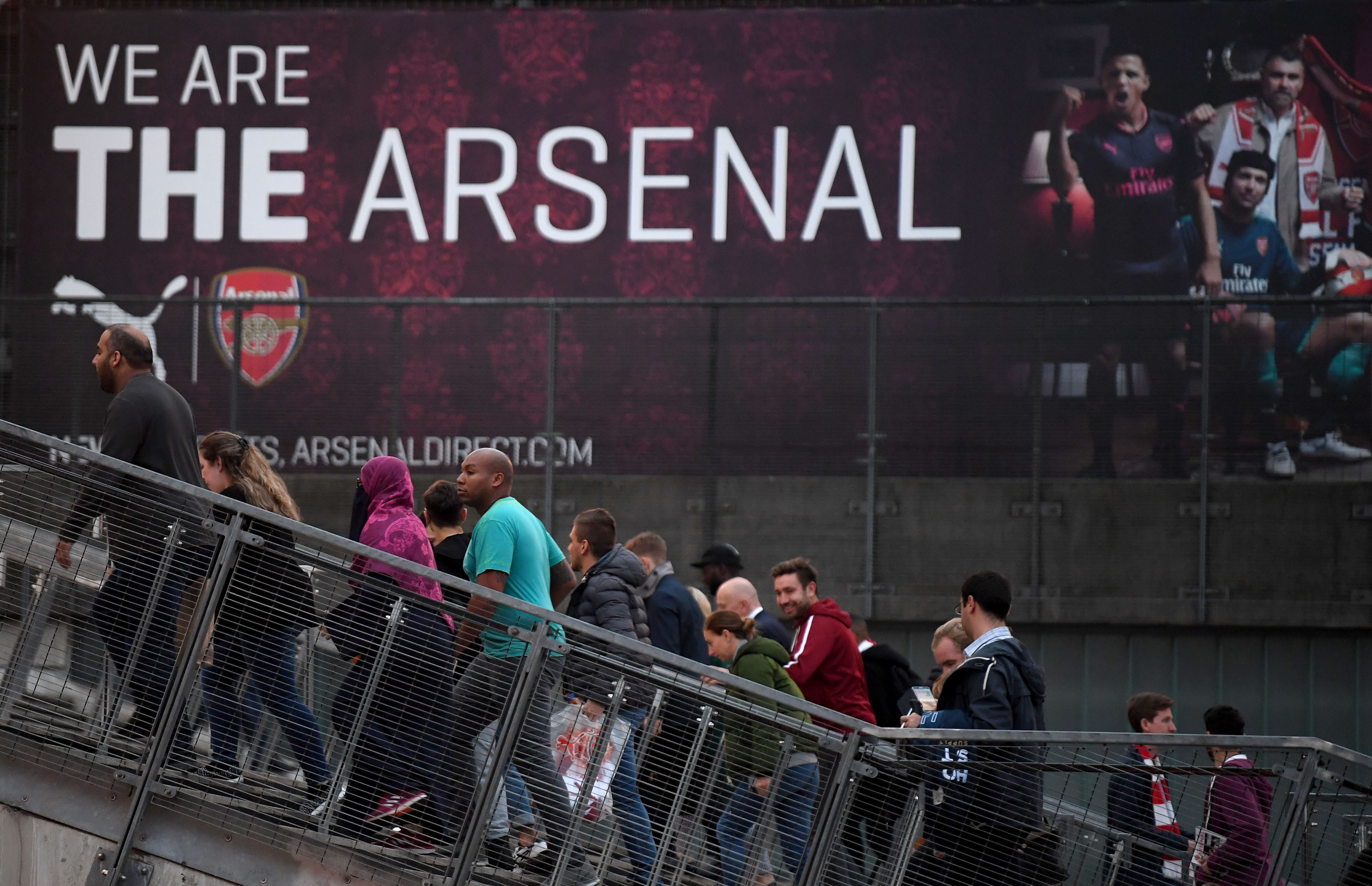LONDON, ENGLAND - SEPTEMBER 25:  Fans walk outside the stadium prior to the Premier League match between Arsenal and West Bromwich Albion at Emirates Stadium on September 25, 2017 in London, England.  (Photo by Mike Hewitt/Getty Images)