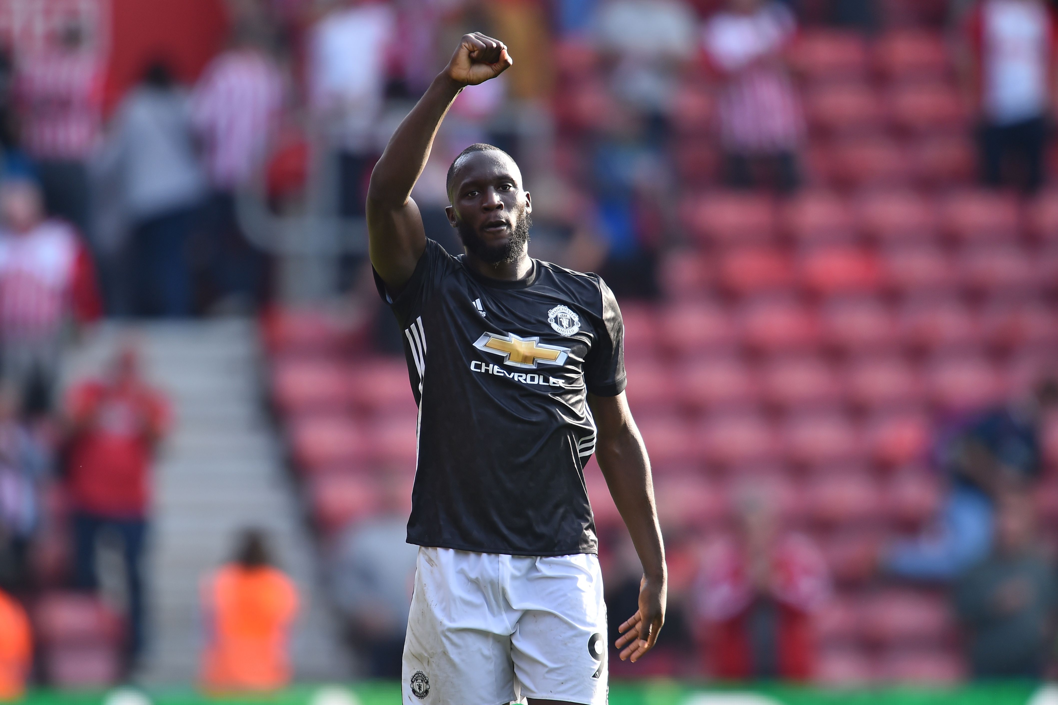 Manchester United's Belgian striker Romelu Lukaku gestures on the pitch after the English Premier League football match between Southampton and Manchester United at St Mary's Stadium in Southampton, southern England on September 23, 2017.
Manchester United won the game 1-0. / AFP PHOTO / Glyn KIRK / RESTRICTED TO EDITORIAL USE. No use with unauthorized audio, video, data, fixture lists, club/league logos or 'live' services. Online in-match use limited to 75 images, no video emulation. No use in betting, games or single club/league/player publications.  /         (Photo credit should read GLYN KIRK/AFP/Getty Images)