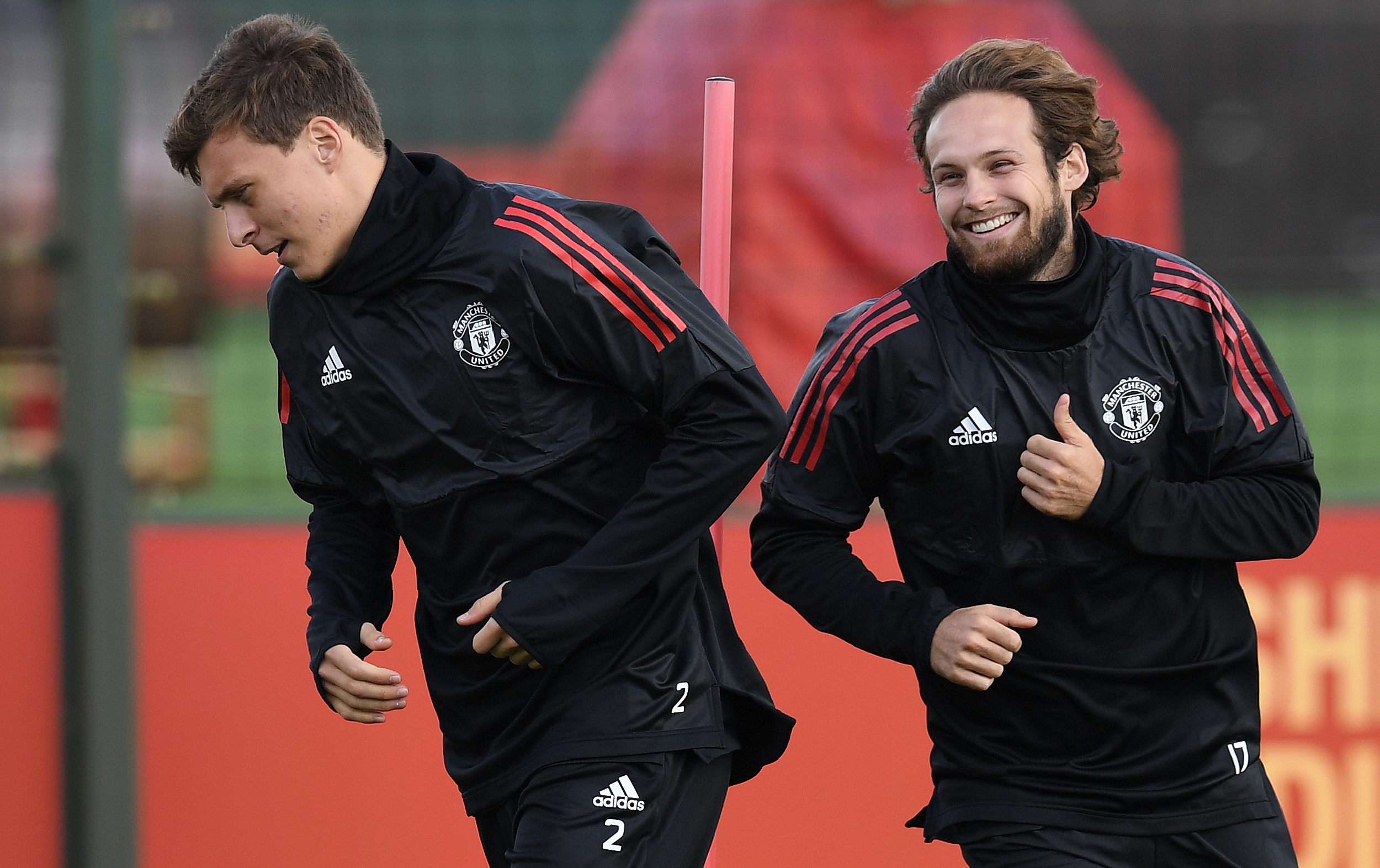 Manchester United's Swedish defender Victor Lindelof (L) and Manchester United's Dutch midfielder Daley Blind attends a team training session at the club's training complex near Carrington, west of Manchester in north west England on September 11, 2017, on the eve of their UEFA Champions League Group A football match against FC Basel. / AFP PHOTO / Paul ELLIS        (Photo credit should read PAUL ELLIS/AFP/Getty Images)