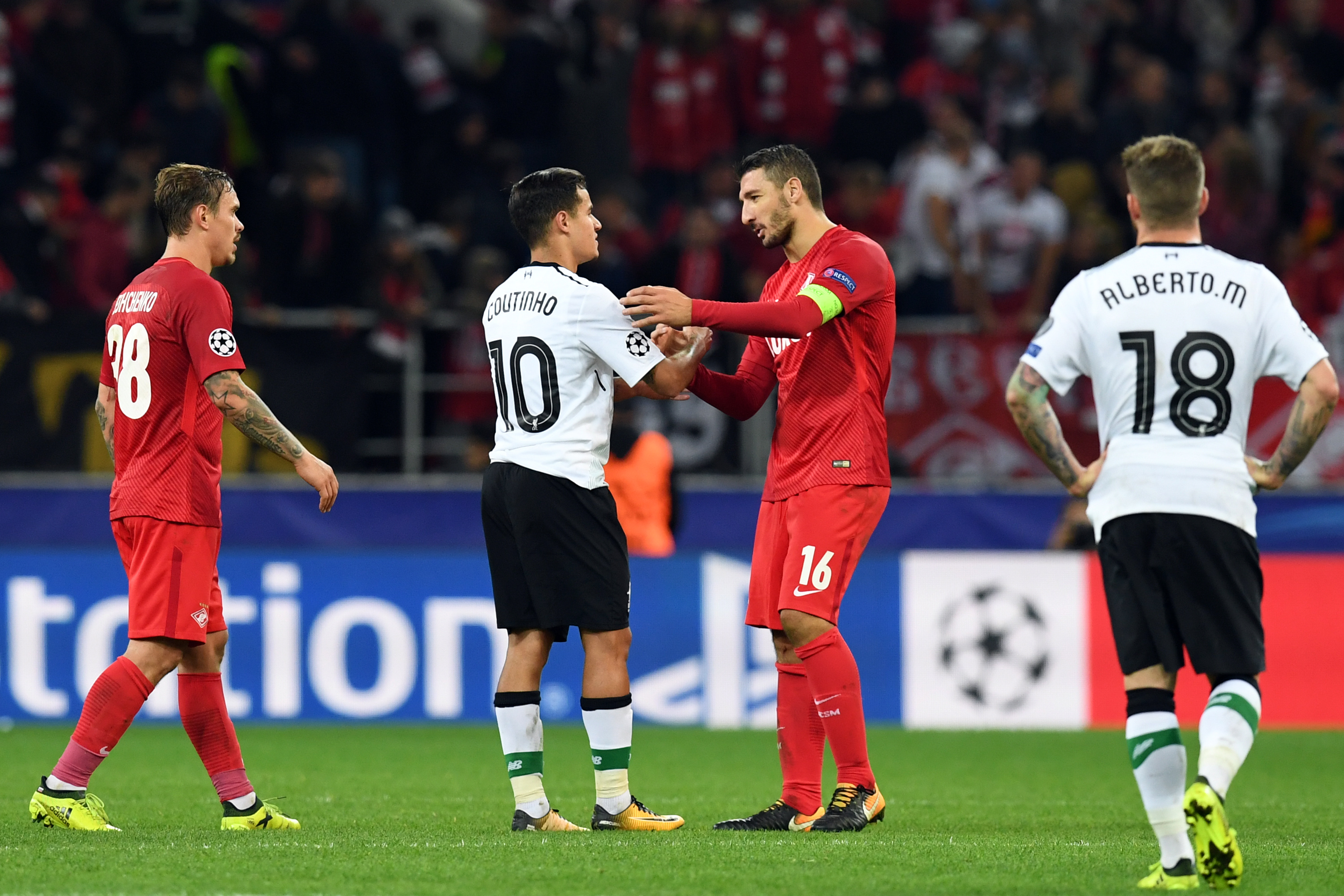 Spartak Moscow's defender from Italy Salvatore Bocchetti greets Liverpool's midfielder from Brazil Philippe Coutinho Correia after the UEFA Champions League Group E football match between FC Spartak Moscow and Liverpool FC at the Otkrytie Arena stadium in Moscow on September 26, 2017. / AFP PHOTO / Kirill KUDRYAVTSEV        (Photo credit should read KIRILL KUDRYAVTSEV/AFP/Getty Images)