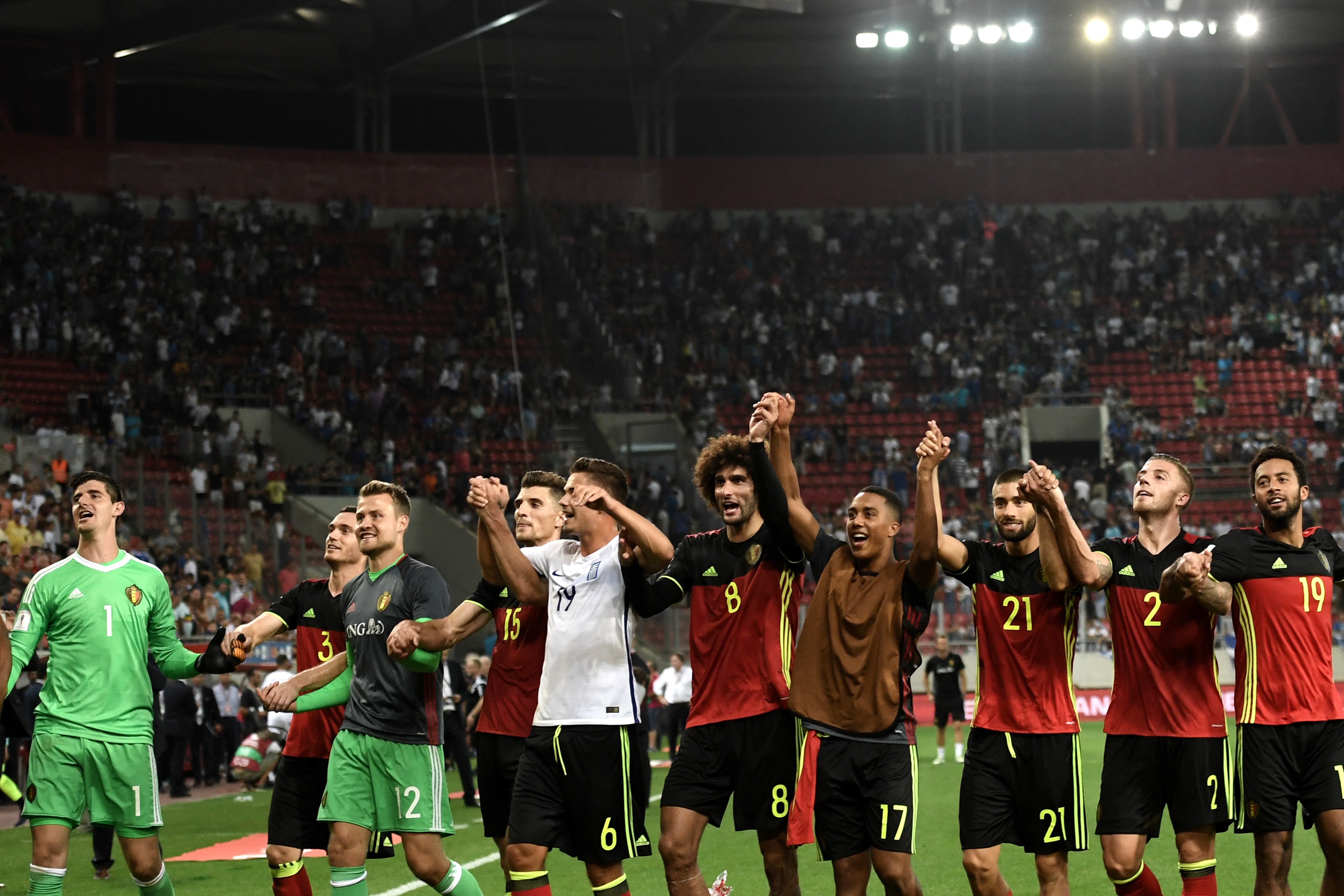 Belgium's players including Marouane Fellani (C) celebrate after their team's victory against Greece in their Group H 2018 FIFA World Cup qualifying football match between Greece and Belgium at The Georgios Karaiskakis Stadium in Piraeus near Athens on September 3, 2017. / AFP PHOTO / ARIS MESSINIS        (Photo credit should read ARIS MESSINIS/AFP/Getty Images)