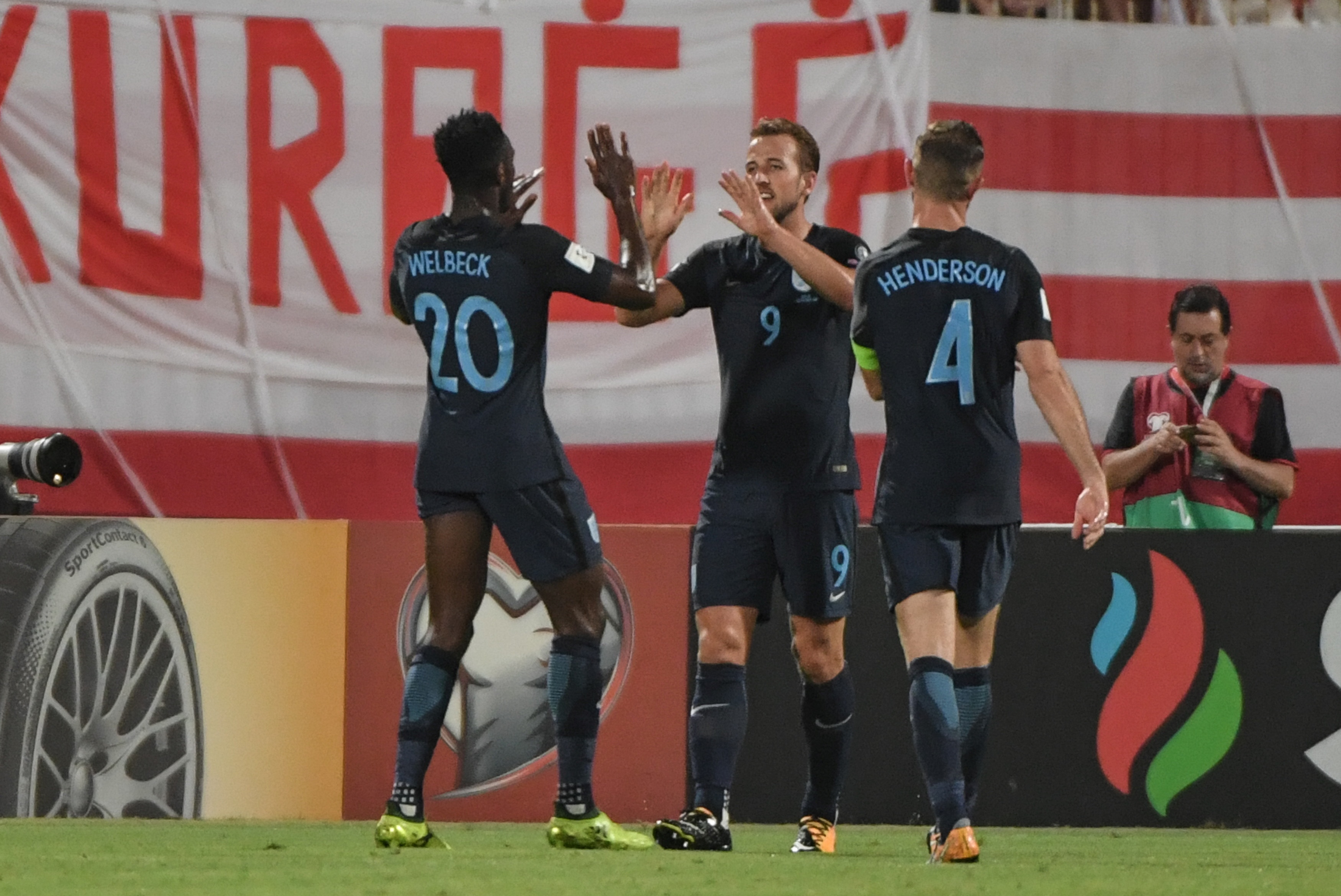 England's striker Harry Kane (C) celebrates with his team mates after scoring against Malta during  the 2018 FIFA World Cup qualifying football match Malta vs England at the National Stadium in Malta's Ta' Qali village, on September 1, 2017.  / AFP PHOTO / ANDREAS SOLARO        (Photo credit should read ANDREAS SOLARO/AFP/Getty Images)