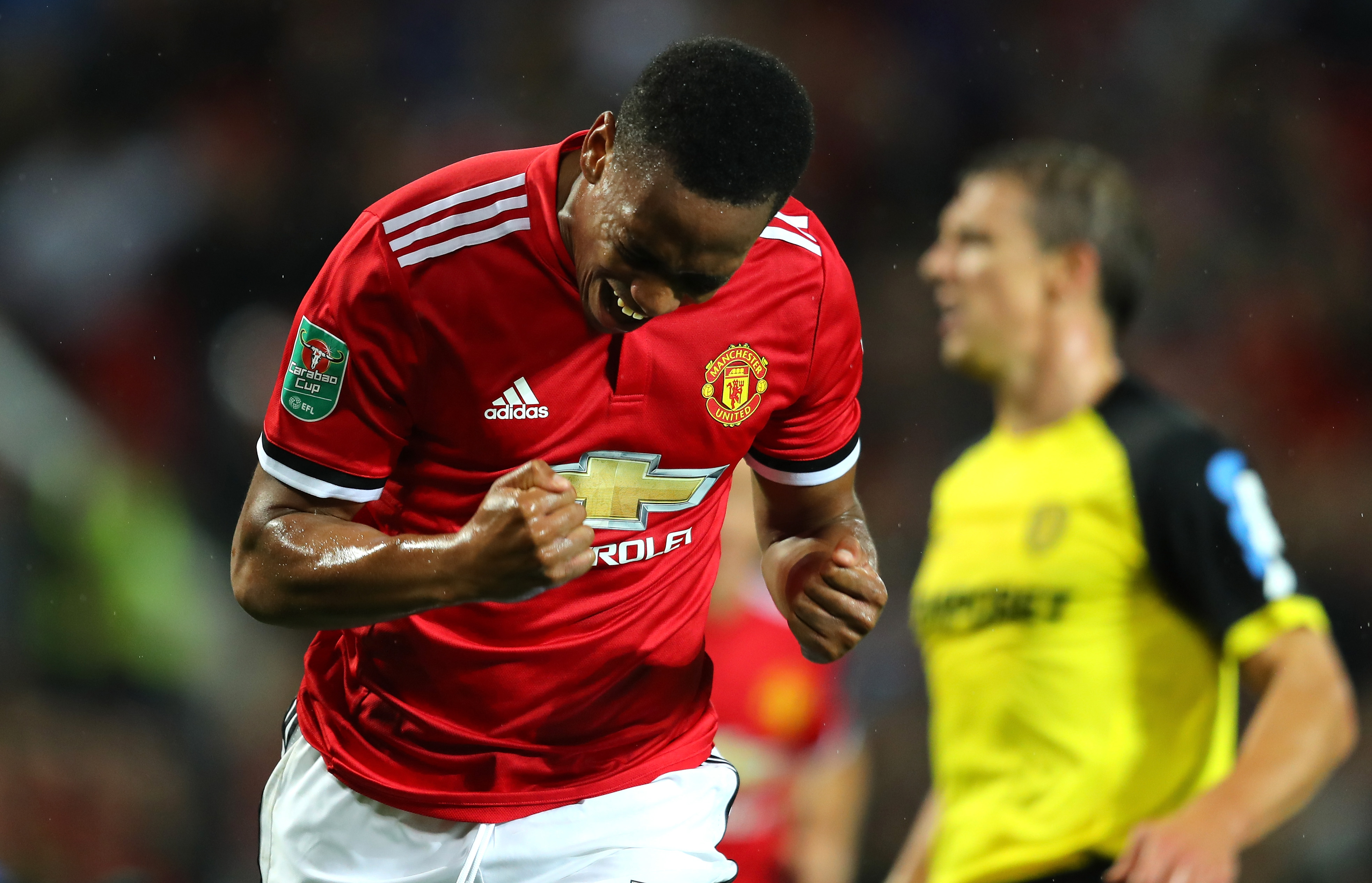 MANCHESTER, ENGLAND - SEPTEMBER 20:  Anthony Martial of Manchester United celebrates scoring his sides fourth goal during the Carabao Cup Third Round match between Manchester United and Burton Albion at Old Trafford on September 20, 2017 in Manchester, England.  (Photo by Richard Heathcote/Getty Images)