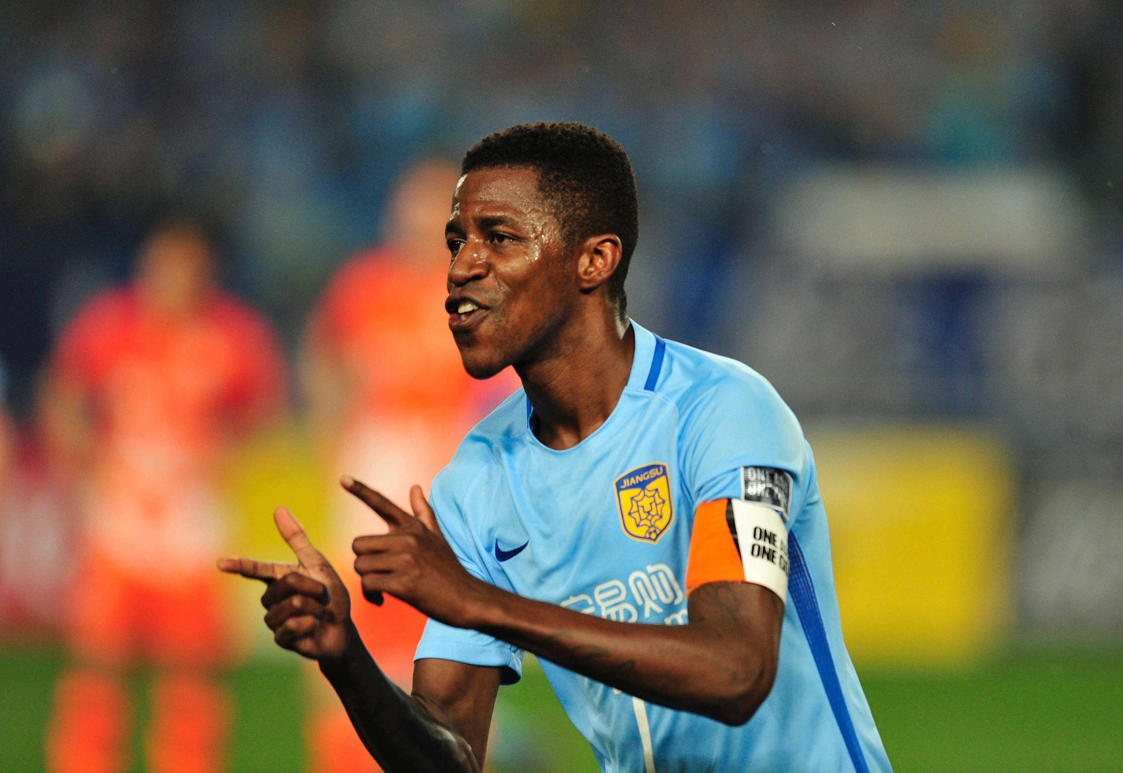 Ramires Santos of Jiangsu FC celebrates after scoring a goal during the AFC Champions League group stage football match against Jeju United FC in Nanjing, east China's Jiangsu province, on April 25, 2017. / AFP PHOTO / STR        (Photo credit should read STR/AFP/Getty Images)