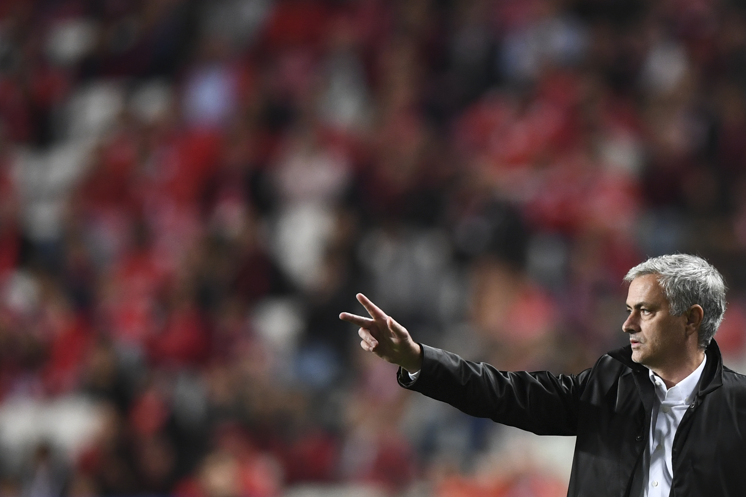 Manchester United's Portuguese manager Jose Mourinho gestures during the UEFA Champions League group A football match SL Benfica vs Manchester United FC at the Luz stadium in Lisbon on Ocotber 18, 2017. / AFP PHOTO / PATRICIA DE MELO MOREIRA        (Photo credit should read PATRICIA DE MELO MOREIRA/AFP/Getty Images)
