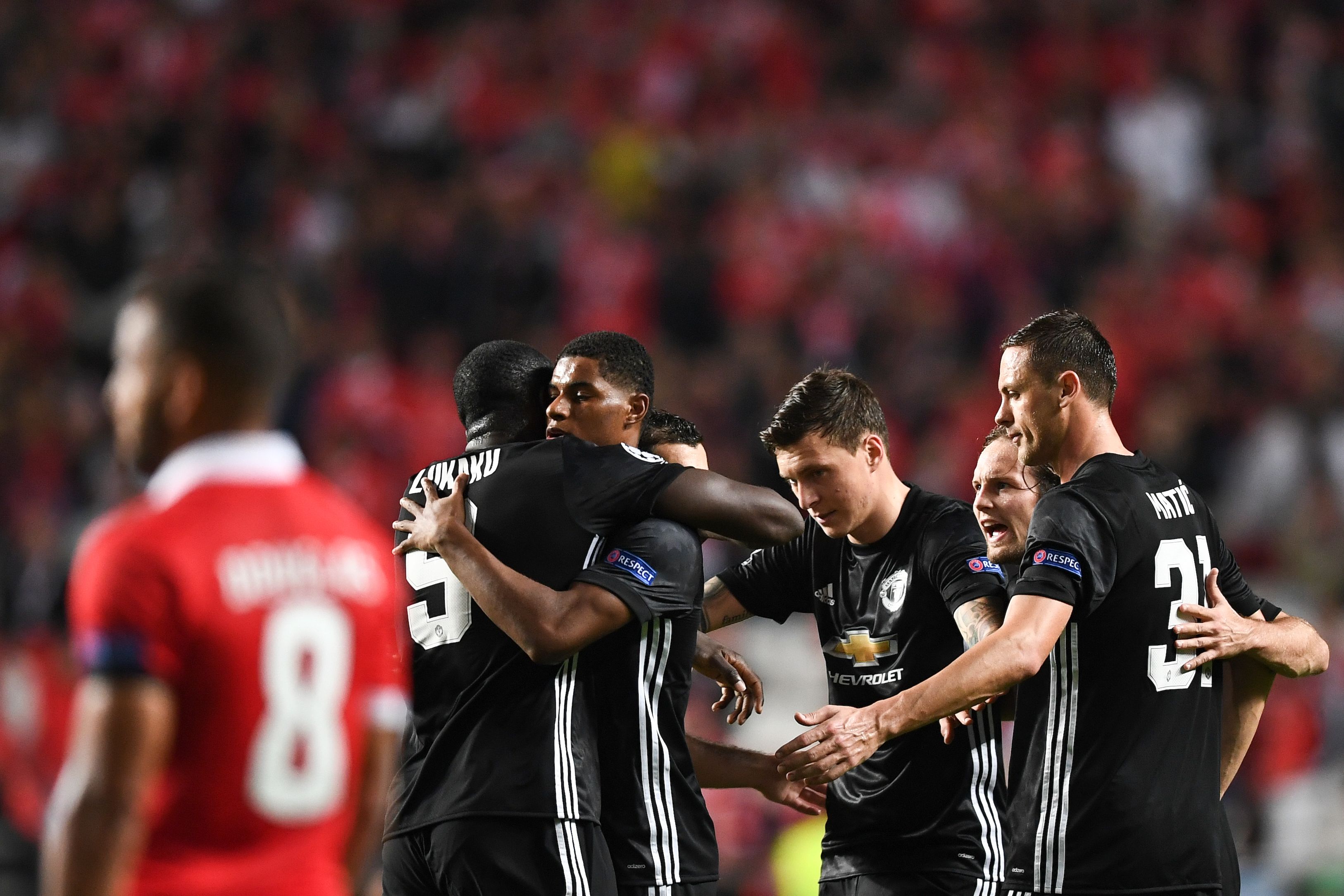 Manchester United's forward Marcus Rashford (2L) celebrates a goal during the UEFA Champions League group A football match SL Benfica vs Manchester United FC at the Luz stadium in Lisbon on Ocotber 18, 2017. / AFP PHOTO / PATRICIA DE MELO MOREIRA        (Photo credit should read PATRICIA DE MELO MOREIRA/AFP/Getty Images)