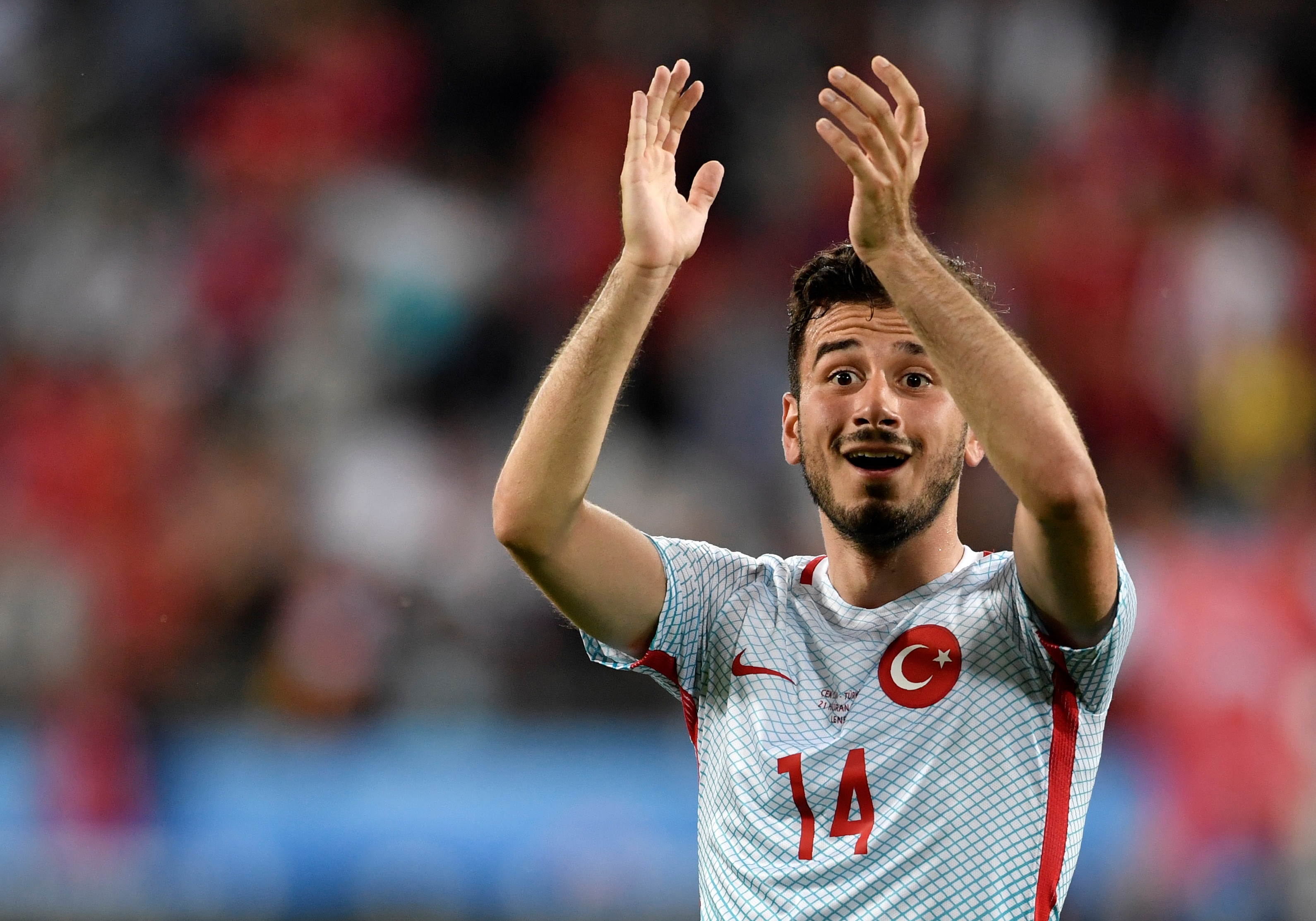 Turkey's midfielder Oguzhan Ozyakup celebrates his team's victory at the end of the Euro 2016 group D football match between Czech Republic and Turkey at Bollaert-Delelis stadium in Lens on June 21, 2016. / AFP / PHILIPPE LOPEZ        (Photo credit should read PHILIPPE LOPEZ/AFP/Getty Images)