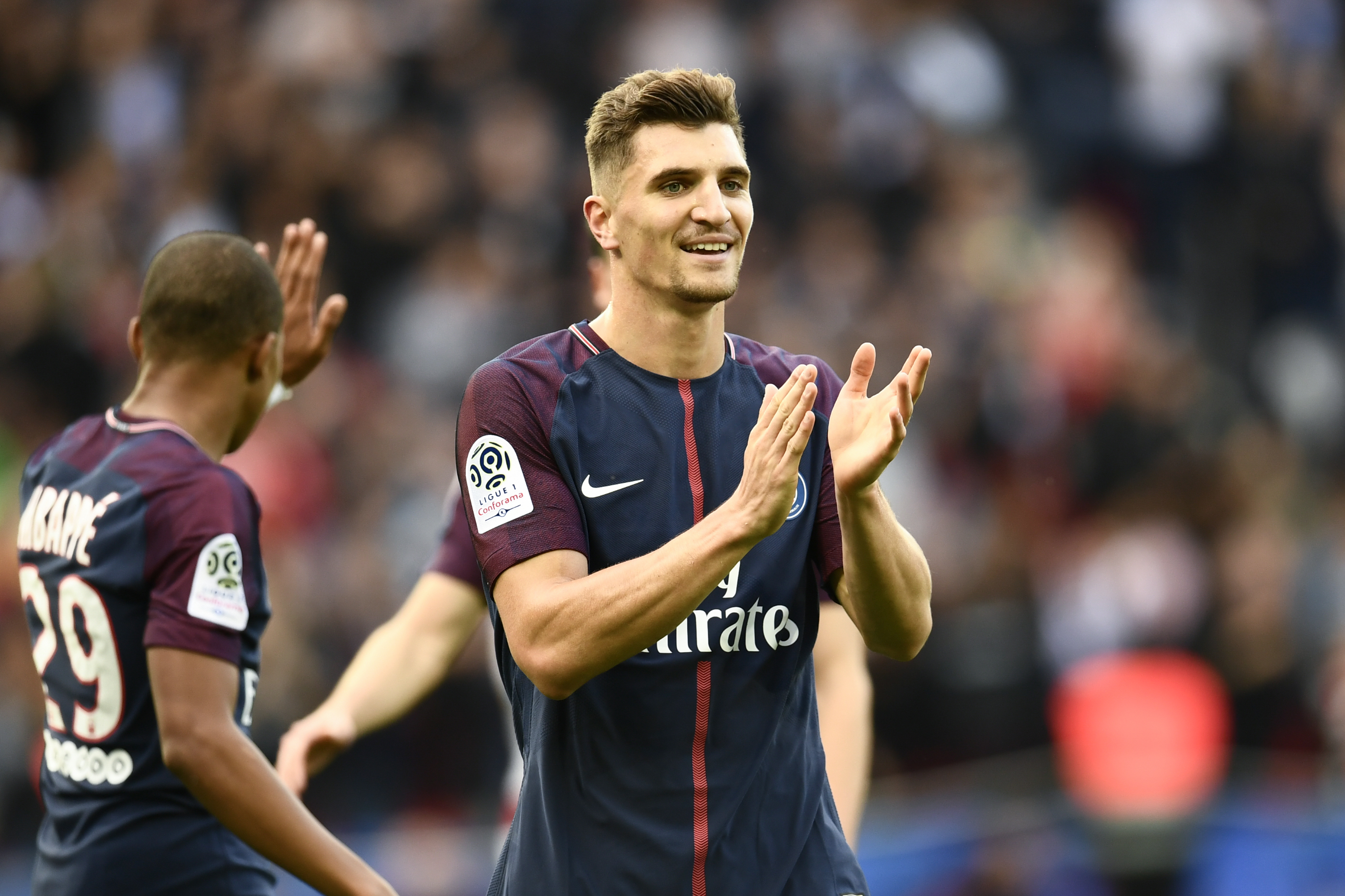 Paris Saint-Germain's French forward Kylian Mbappe (L) and Paris Saint-Germain's Belgian defender Thomas Meunier celebrate after Meunier scored during the French L1 football match Paris Saint-Germain (PSG) vs Bordeaux (FCGB) on September 30, 2017 at the Parc des Princes stadium in Paris. / AFP PHOTO / CHRISTOPHE SIMON        (Photo credit should read CHRISTOPHE SIMON/AFP/Getty Images)