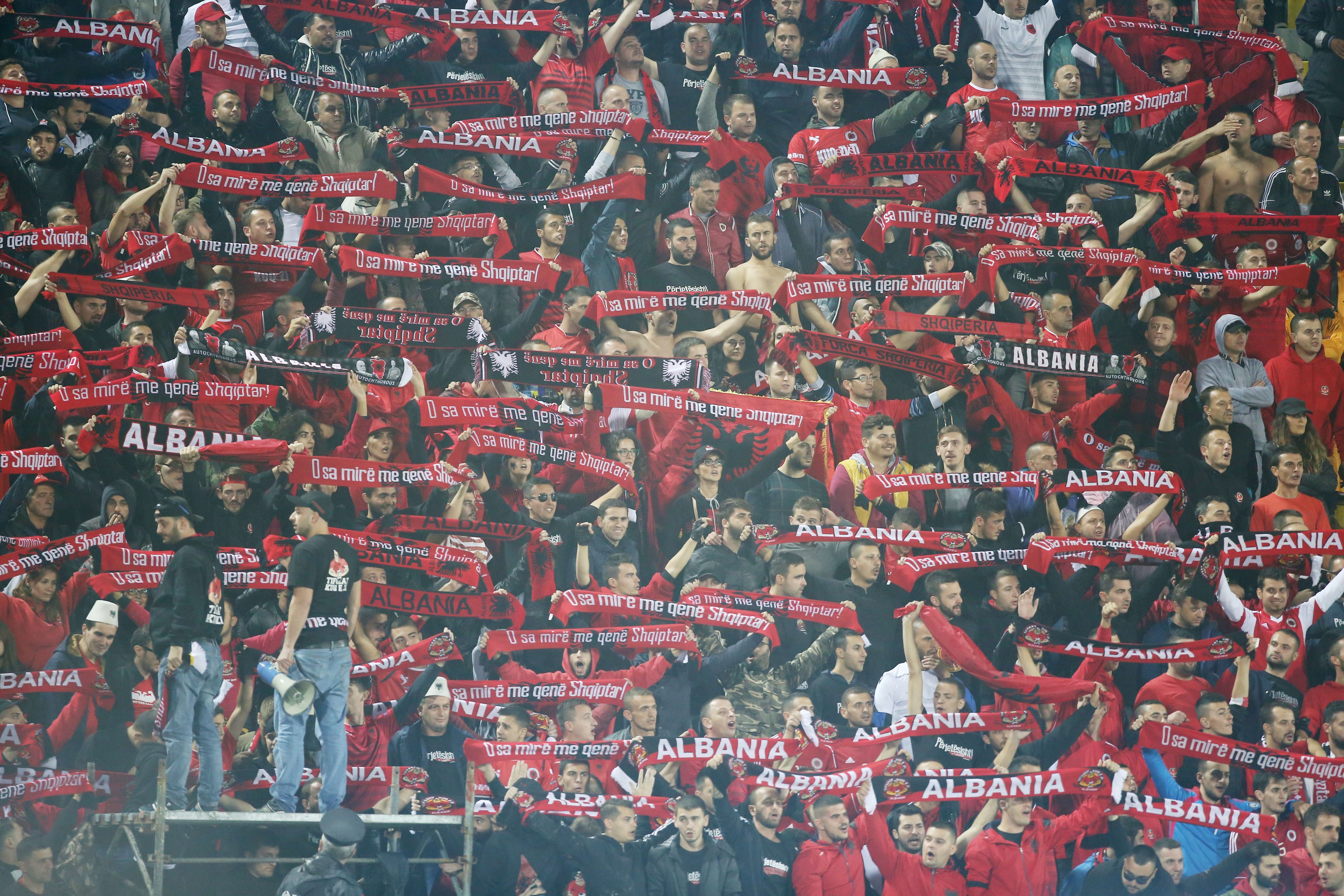 Albanian fans cheer during the World Cup 2018 qualifier football match Albania vs Spain in Loro Borici stadium in the city of Shkoder on October 9, 2016. / AFP / GENT SHKULLAKU        (Photo credit should read GENT SHKULLAKU/AFP/Getty Images)