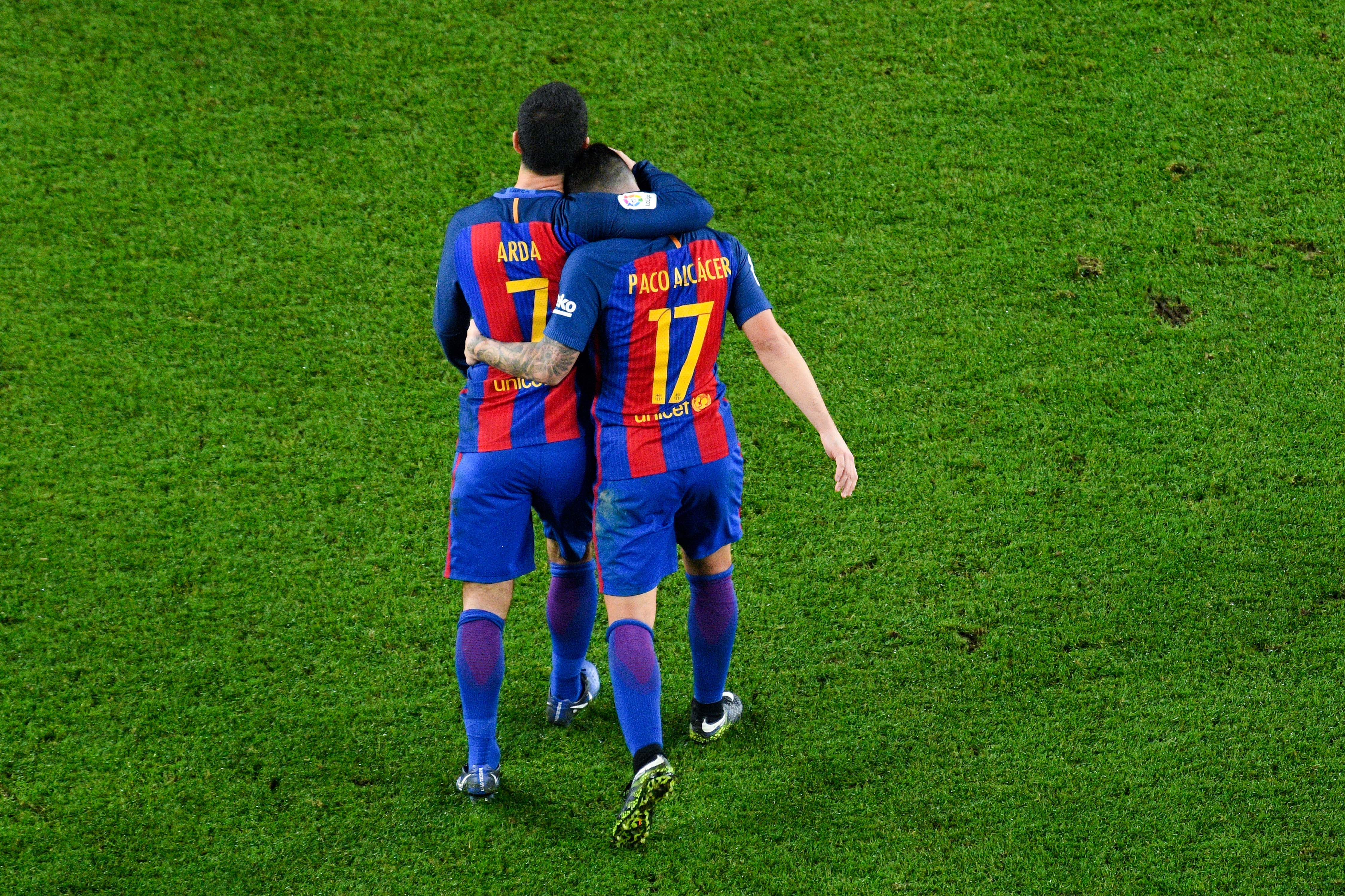 BARCELONA, SPAIN - DECEMBER 21:  Paco Alcacer of FC Barcelona celebrates with his team mate Ardan Turan after scoring his team's fifth goal during the Copa del Rey round of 32 second leg match between FC Barcelona and Hercules at Camp Nou on December 21, 2016 in Barcelona, Spain.  (Photo by David Ramos/Getty Images)