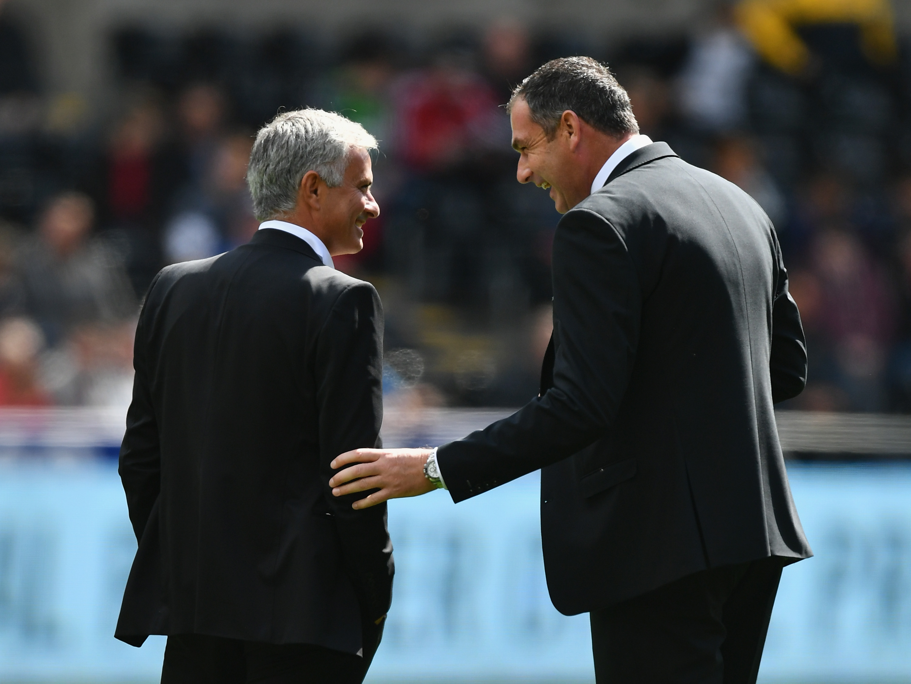 SWANSEA, WALES - AUGUST 19:  Jose Mourinho, Manager of Manchester United and Paul Clement, Manager of Swansea City speak on the pitch prior to the Premier League match between Swansea City and Manchester United at Liberty Stadium on August 19, 2017 in Swansea, Wales.  (Photo by Dan Mullan/Getty Images)