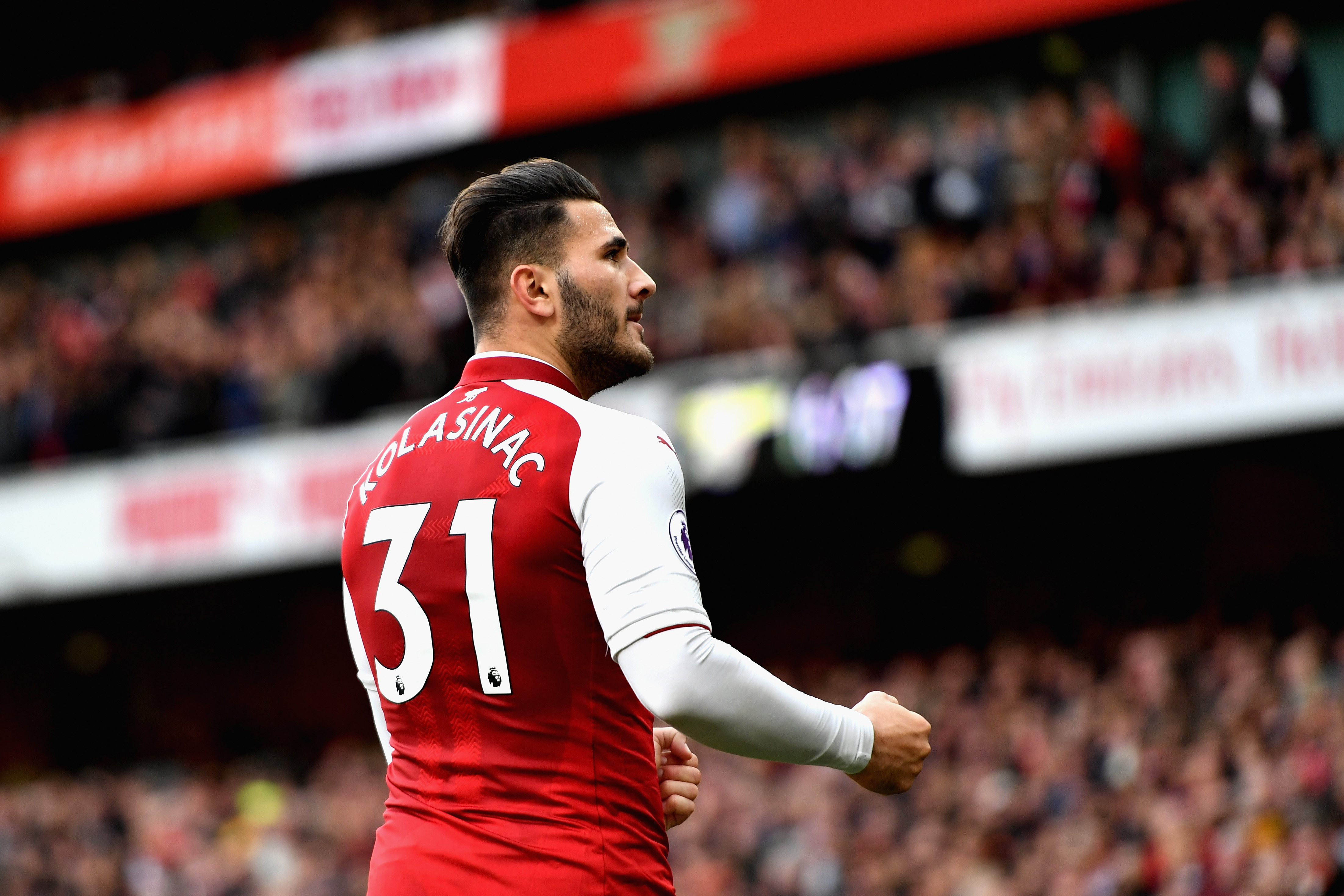 LONDON, ENGLAND - OCTOBER 28:  Sead Kolasinac of Arsenal celebrates scoring his sides first goal during the Premier League match between Arsenal and Swansea City at Emirates Stadium on October 28, 2017 in London, England.  (Photo by Dan Mullan/Getty Images)