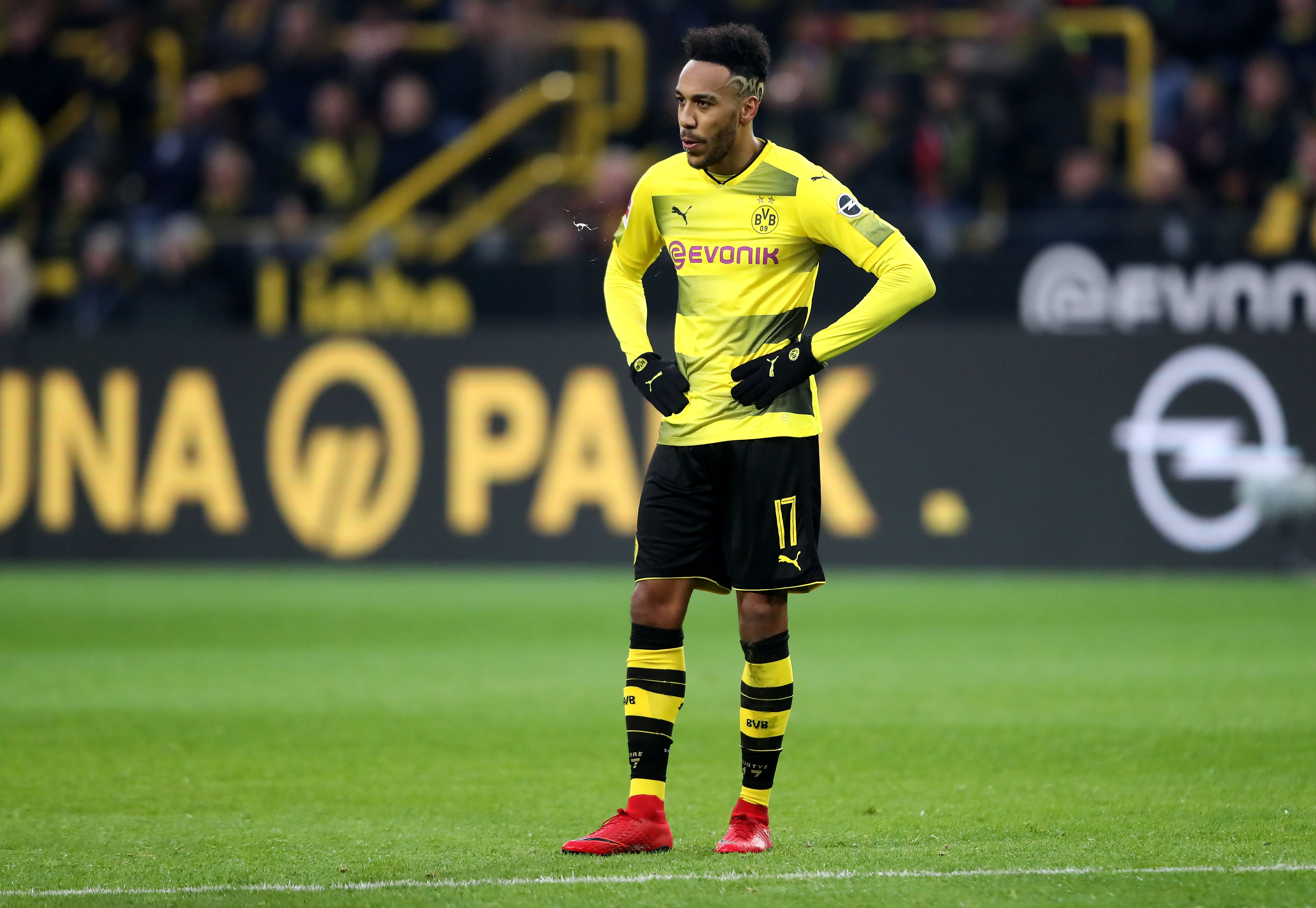 DORTMUND, GERMANY - NOVEMBER 25:  Pierre-Emerick Aubameyang of Dortmund looks thoughtful during the Bundesliga match between Borussia Dortmund and FC Schalke 04 at Signal Iduna Park on November 25, 2017 in Dortmund, Germany.  (Photo by Christof Koepsel/Bongarts/Getty Images)