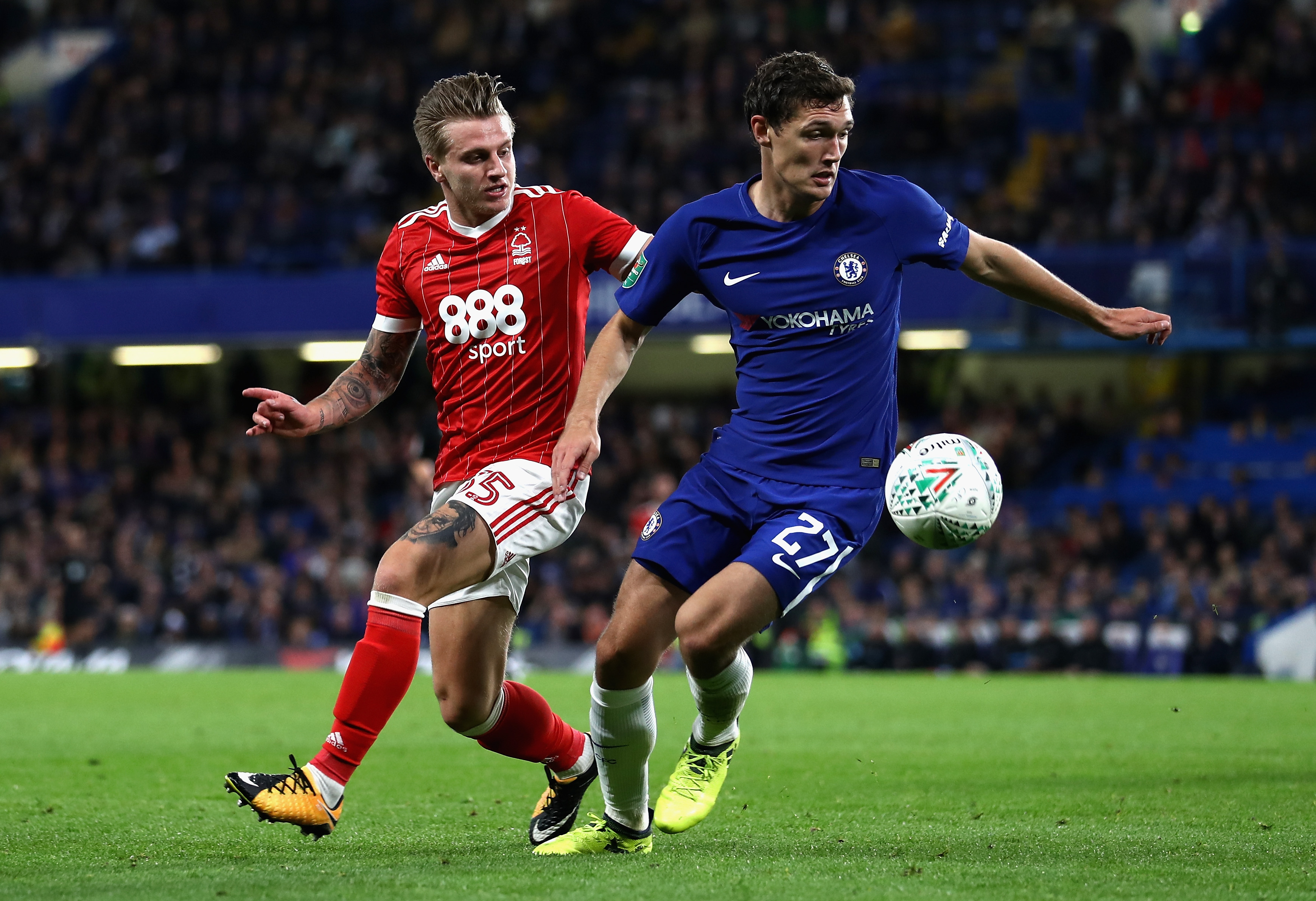 LONDON, ENGLAND - SEPTEMBER 20:  Jason Cummings of Nottingham Forest puts pressure on Andreas Christensen of Chelsea during the Carabao Cup Third Round match between Chelsea and Nottingham Forest at Stamford Bridge on September 19, 2017 in London, England.  (Photo by Bryn Lennon/Getty Images)