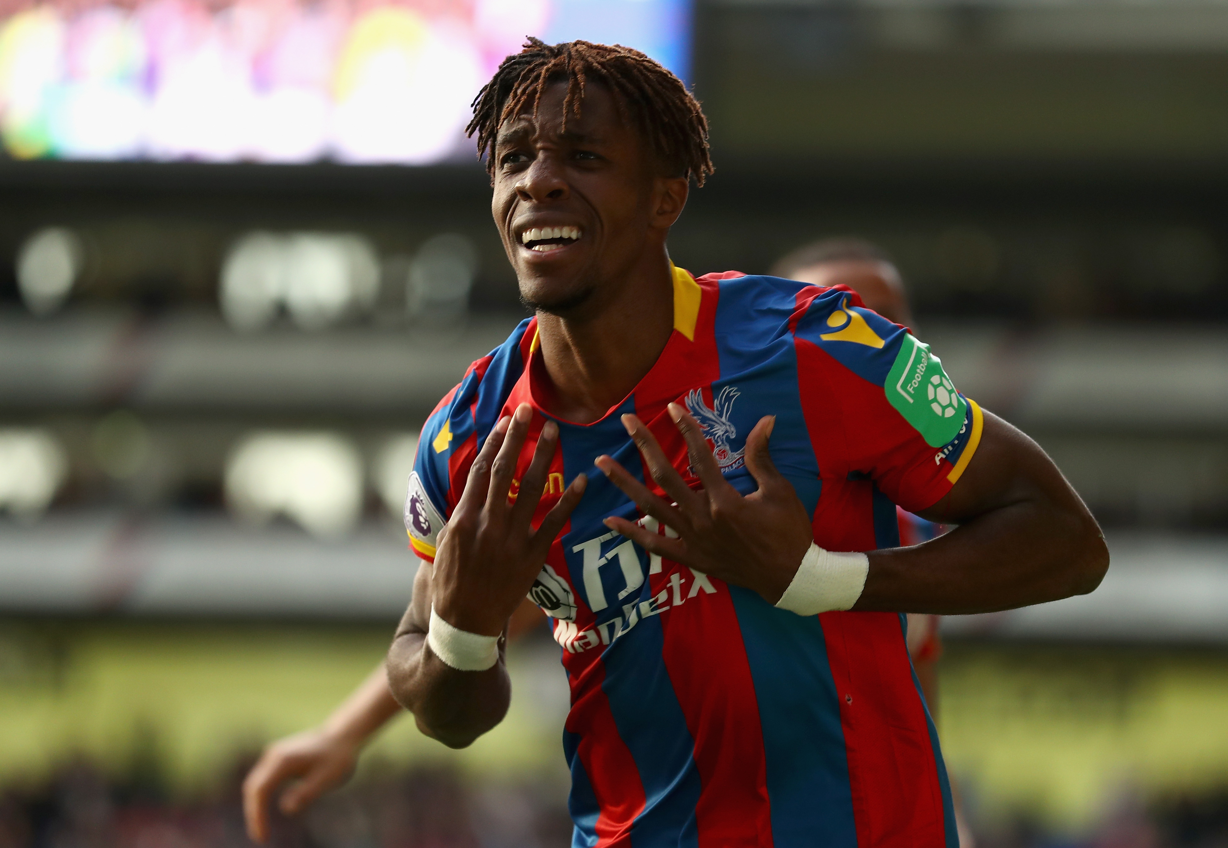 LONDON, ENGLAND - OCTOBER 28:  Wilfried Zaha of Crystal Palace celebrates scoring his sides second goal during the Premier League match between Crystal Palace and West Ham United at Selhurst Park on October 28, 2017 in London, England.  (Photo by Bryn Lennon/Getty Images)