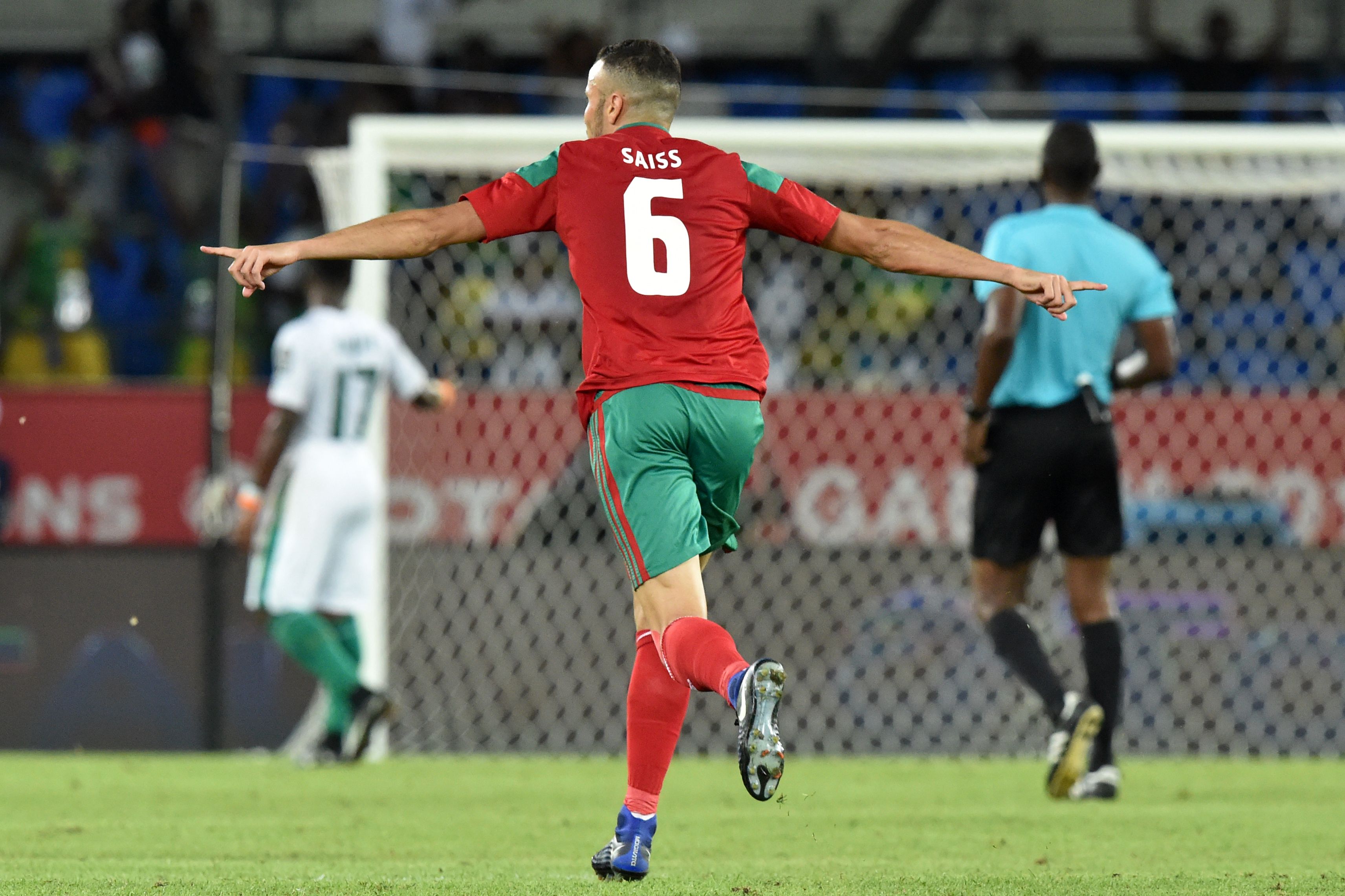 Morocco's midfielder Romain Saiss celebrates after his team scored a goal during the 2017 Africa Cup of Nations group C football match between Morocco and Ivory Coast in Oyem on January 24, 2017. / AFP / ISSOUF SANOGO        (Photo credit should read ISSOUF SANOGO/AFP/Getty Images)