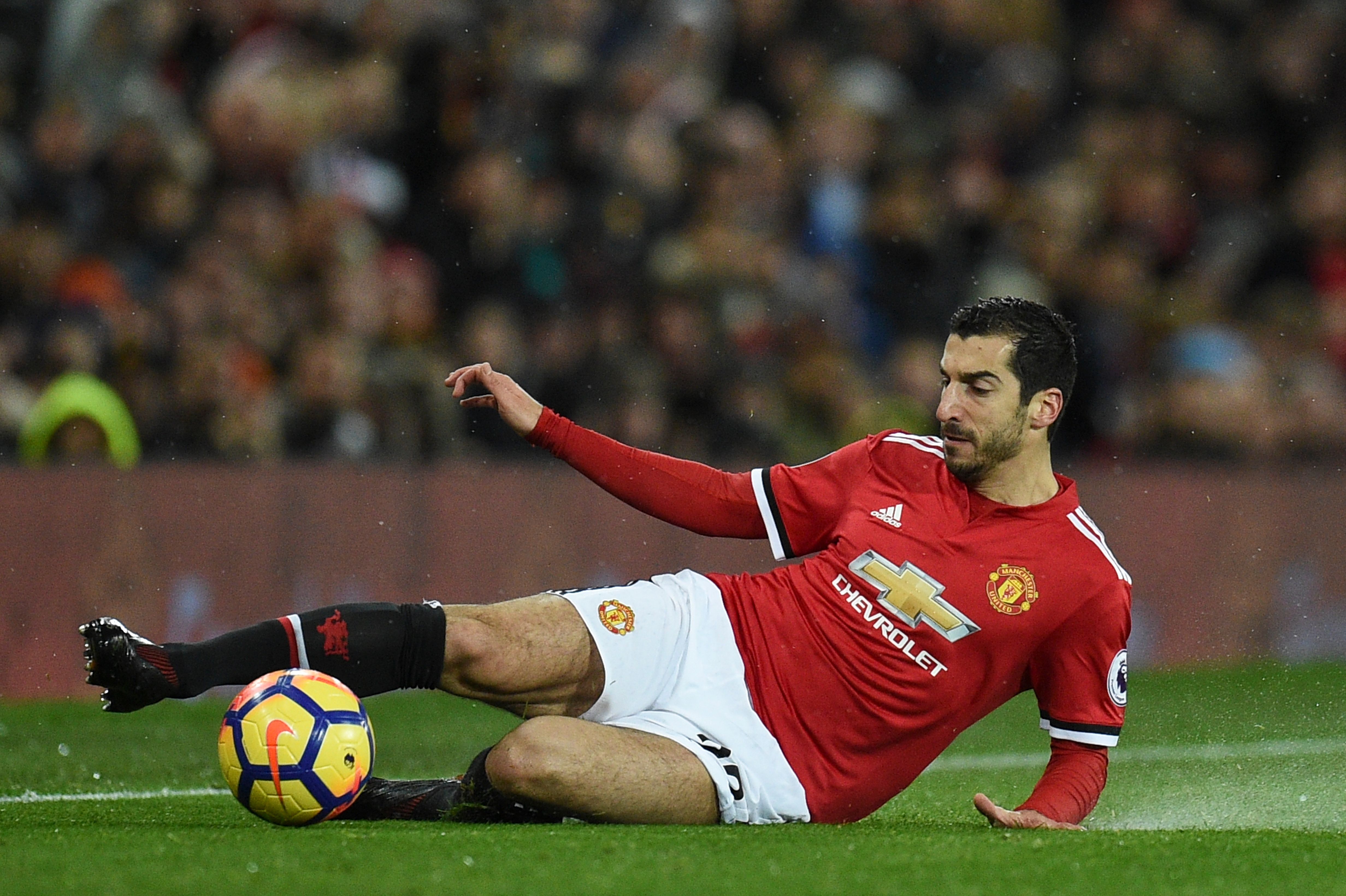 Manchester United's Armenian midfielder Henrikh Mkhitaryan controls the ball during the English Premier League football match between Manchester United and Brighton and Hove Albion at Old Trafford in Manchester, north west England, on November 25, 2017. / AFP PHOTO / Oli SCARFF / RESTRICTED TO EDITORIAL USE. No use with unauthorized audio, video, data, fixture lists, club/league logos or 'live' services. Online in-match use limited to 75 images, no video emulation. No use in betting, games or single club/league/player publications.  /         (Photo credit should read OLI SCARFF/AFP/Getty Images)