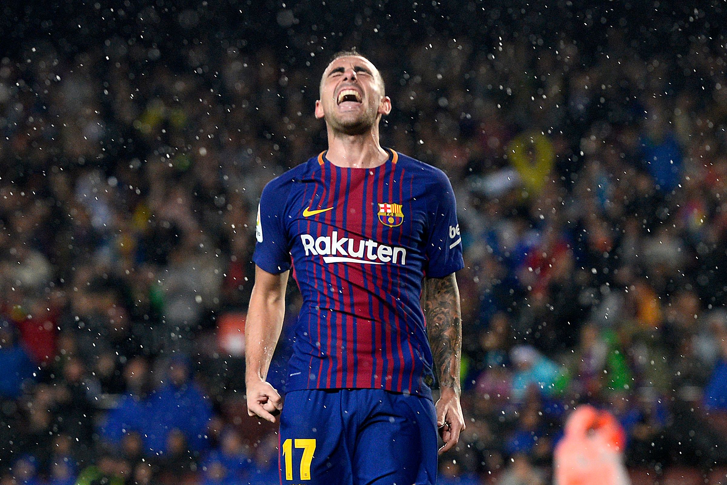 Barcelona's Spanish forward Paco Alcacer celebrates after scoring a goal during the Spanish league football match FC Barcelona vs Sevilla FC at the Camp Nou stadium in Barcelona on November 4, 2017. / AFP PHOTO / Josep LAGO        (Photo credit should read JOSEP LAGO/AFP/Getty Images)