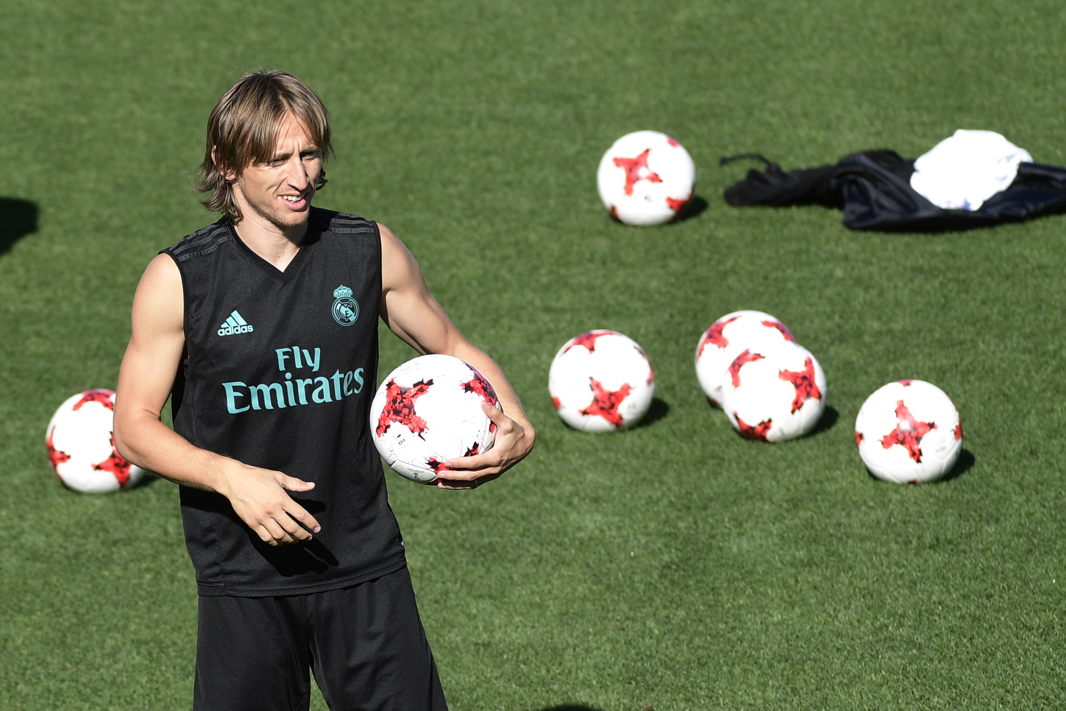 Real Madrid's Croatian midfielder Luka Modric takes part in a training session at Real Madrid sport city in Madrid on August 12, 2017, on the eve of the Spanish SuperCup first leg football match Real Madrid CF vs FC Barcelona. / AFP PHOTO / JAVIER SORIANO        (Photo credit should read JAVIER SORIANO/AFP/Getty Images)